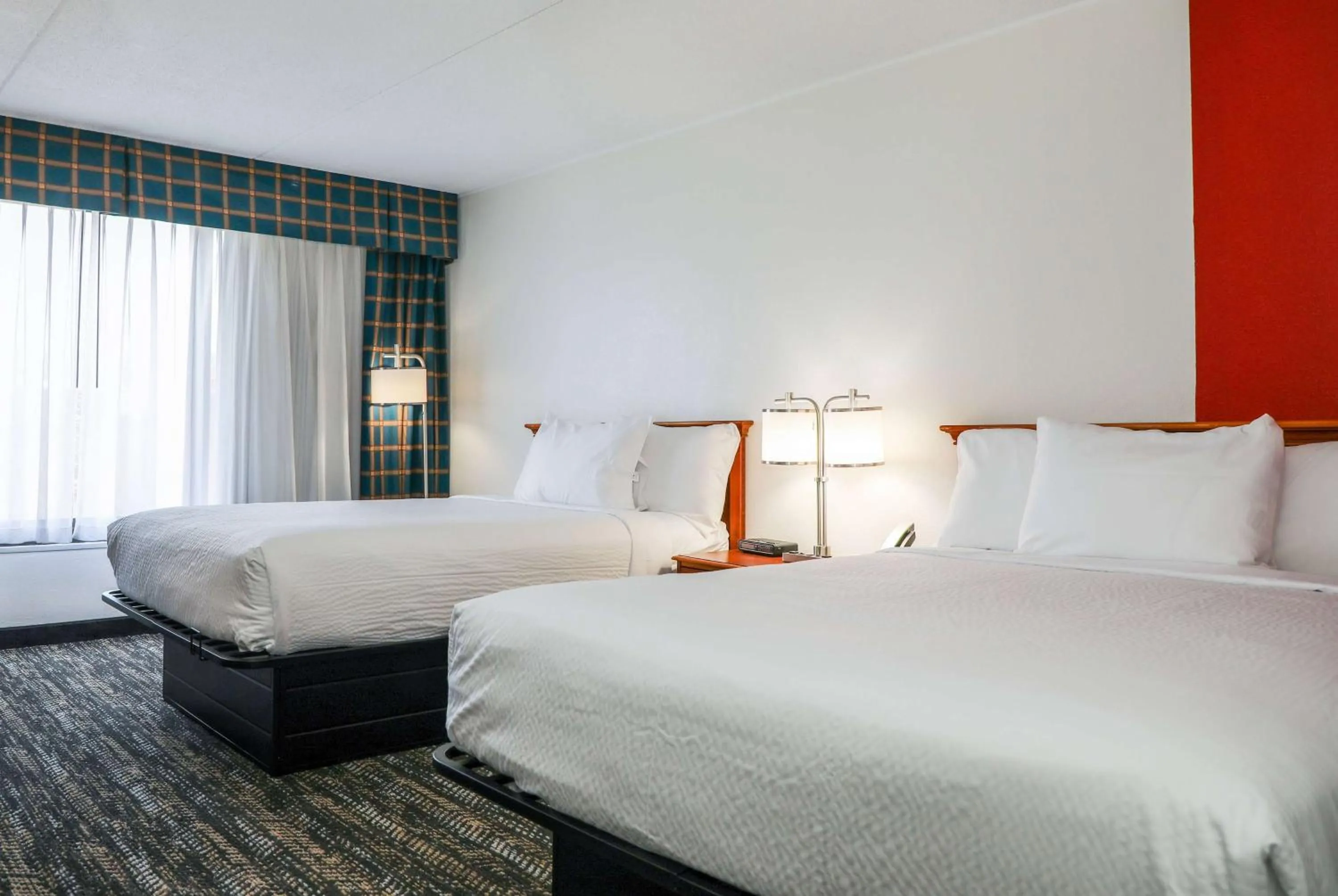 Photo of the whole room, Bed in Ramada by Wyndham Cumberland Downtown