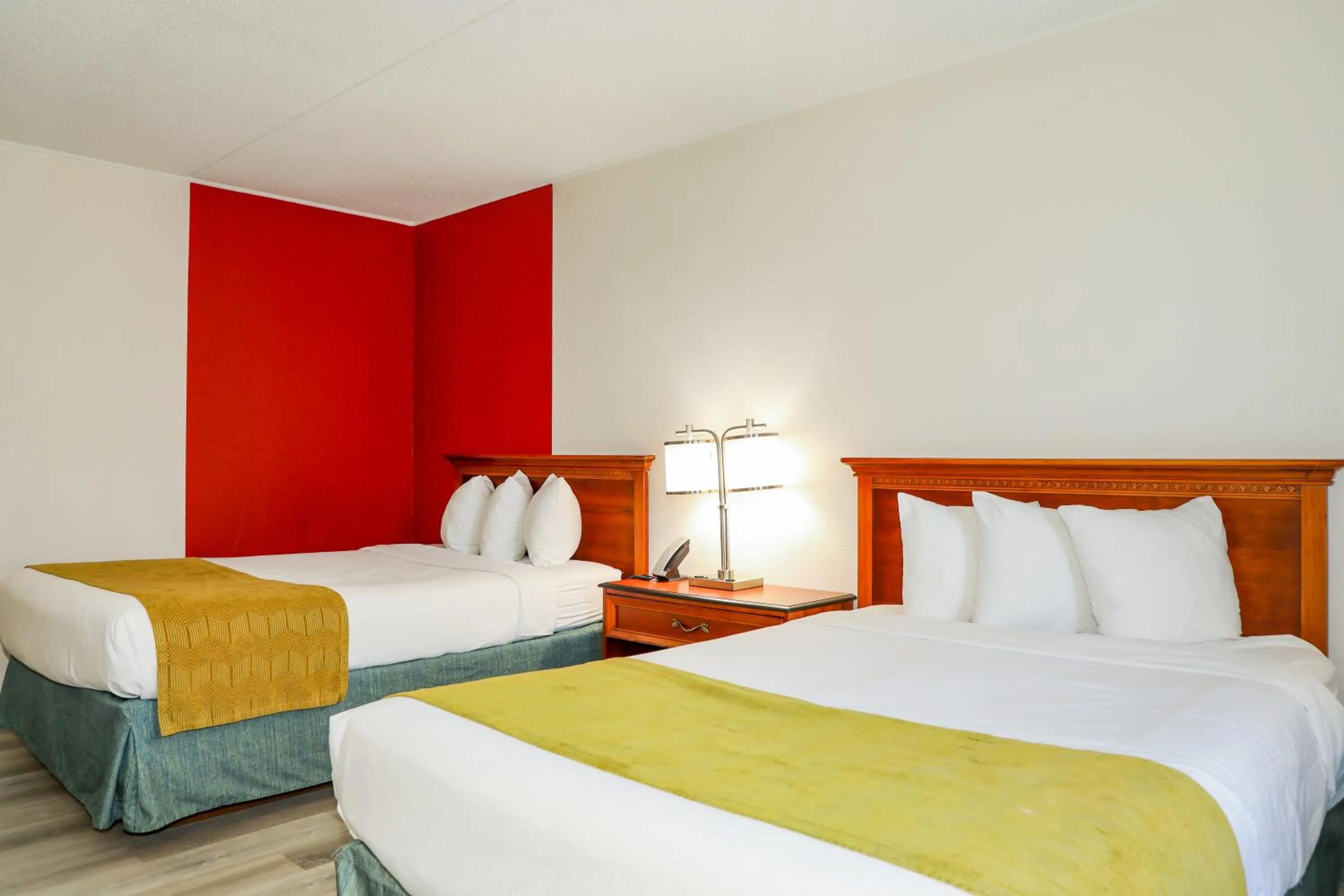 Photo of the whole room, Bed in Ramada by Wyndham Cumberland Downtown