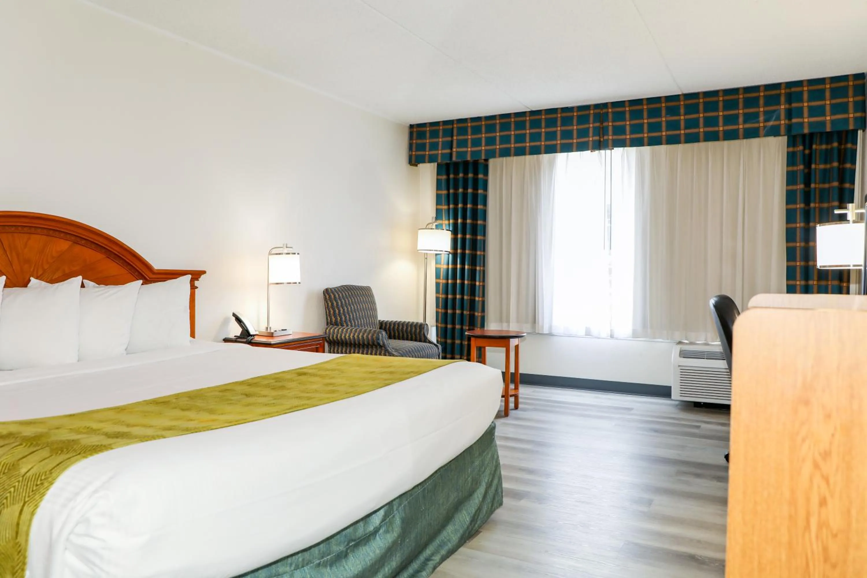 Photo of the whole room, Bed in Ramada by Wyndham Cumberland Downtown