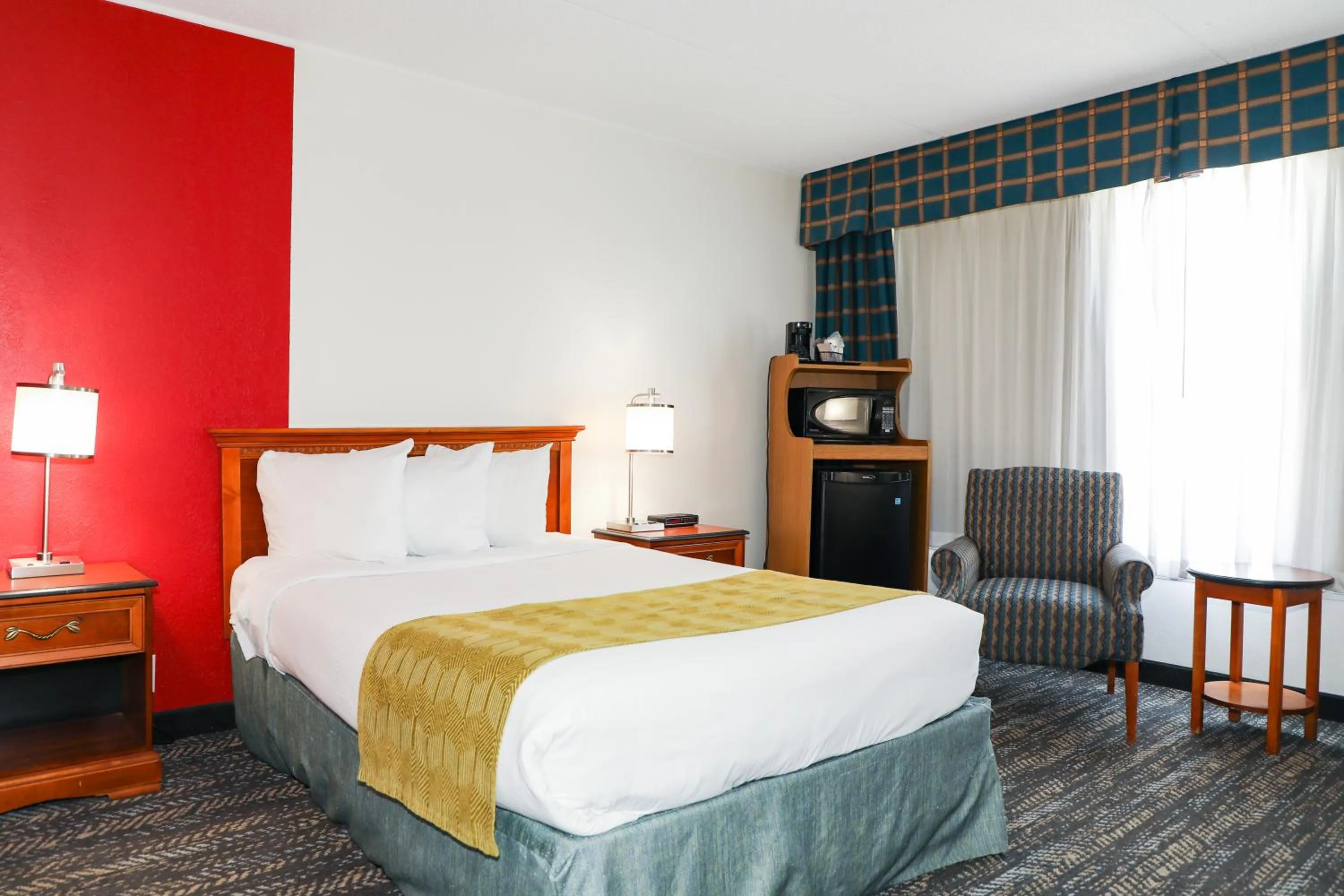Photo of the whole room, Bed in Ramada by Wyndham Cumberland Downtown