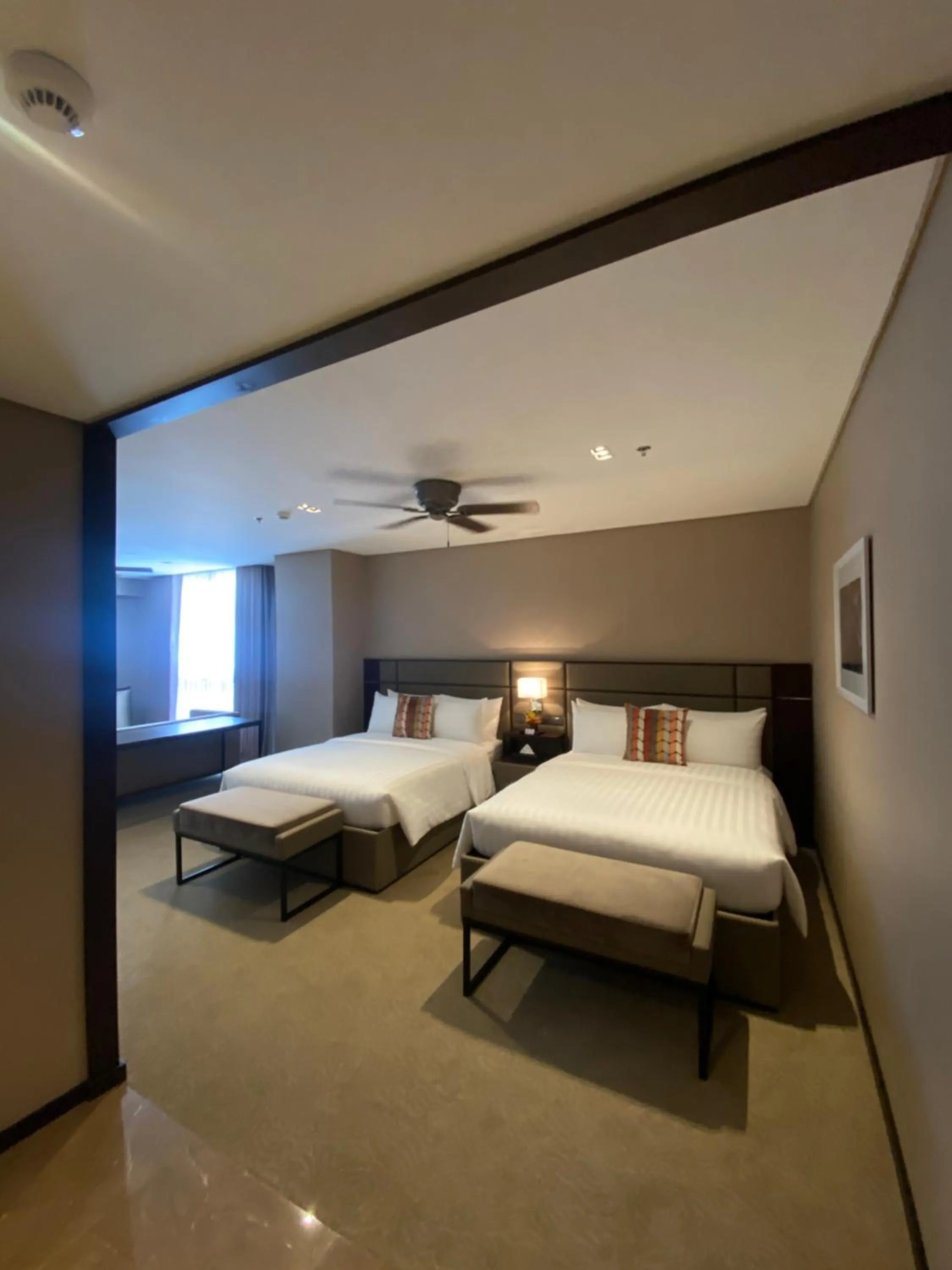 Bed in The Plaza Garden Hotel and Residences