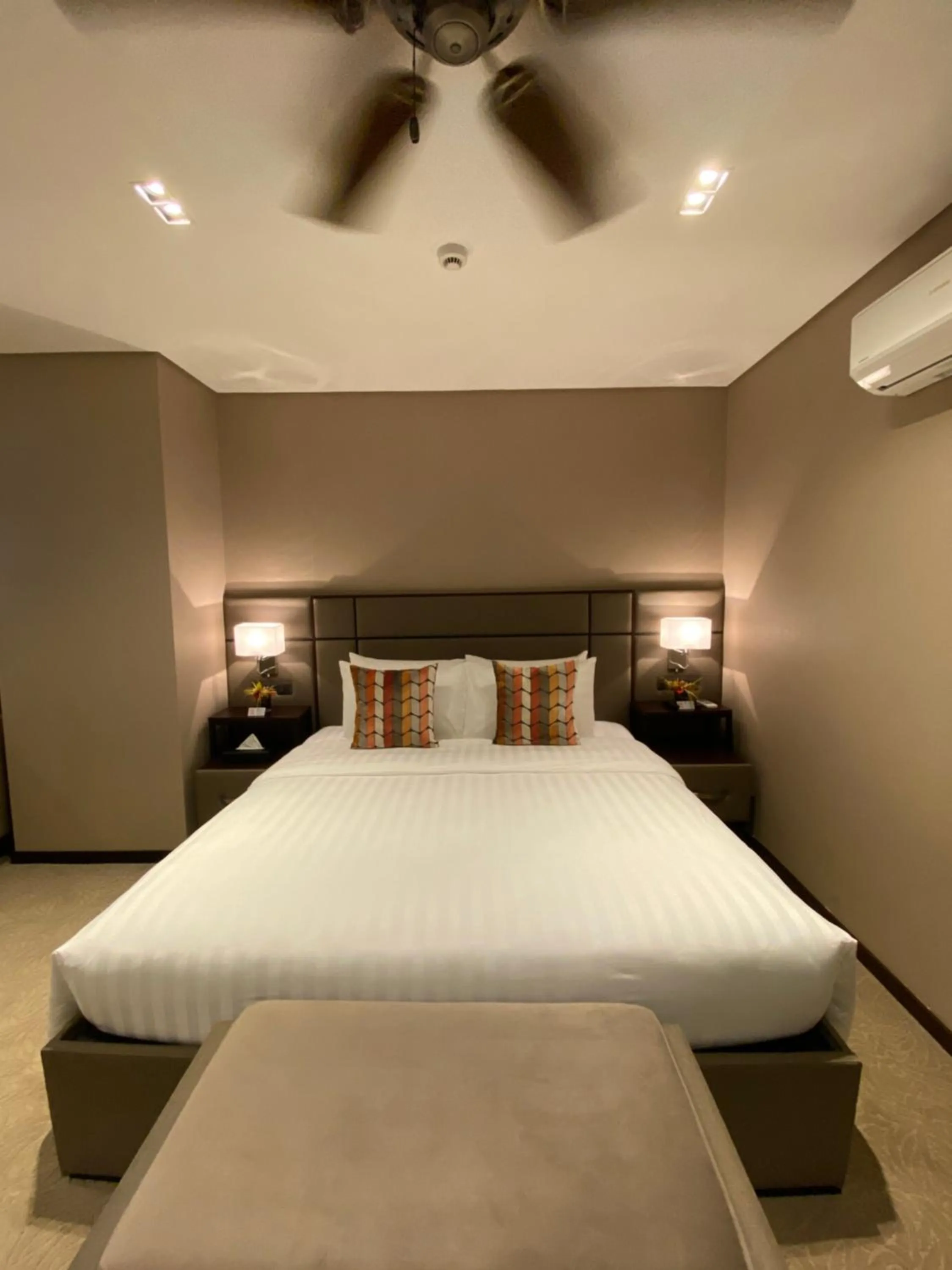 Bed in The Plaza Garden Hotel and Residences