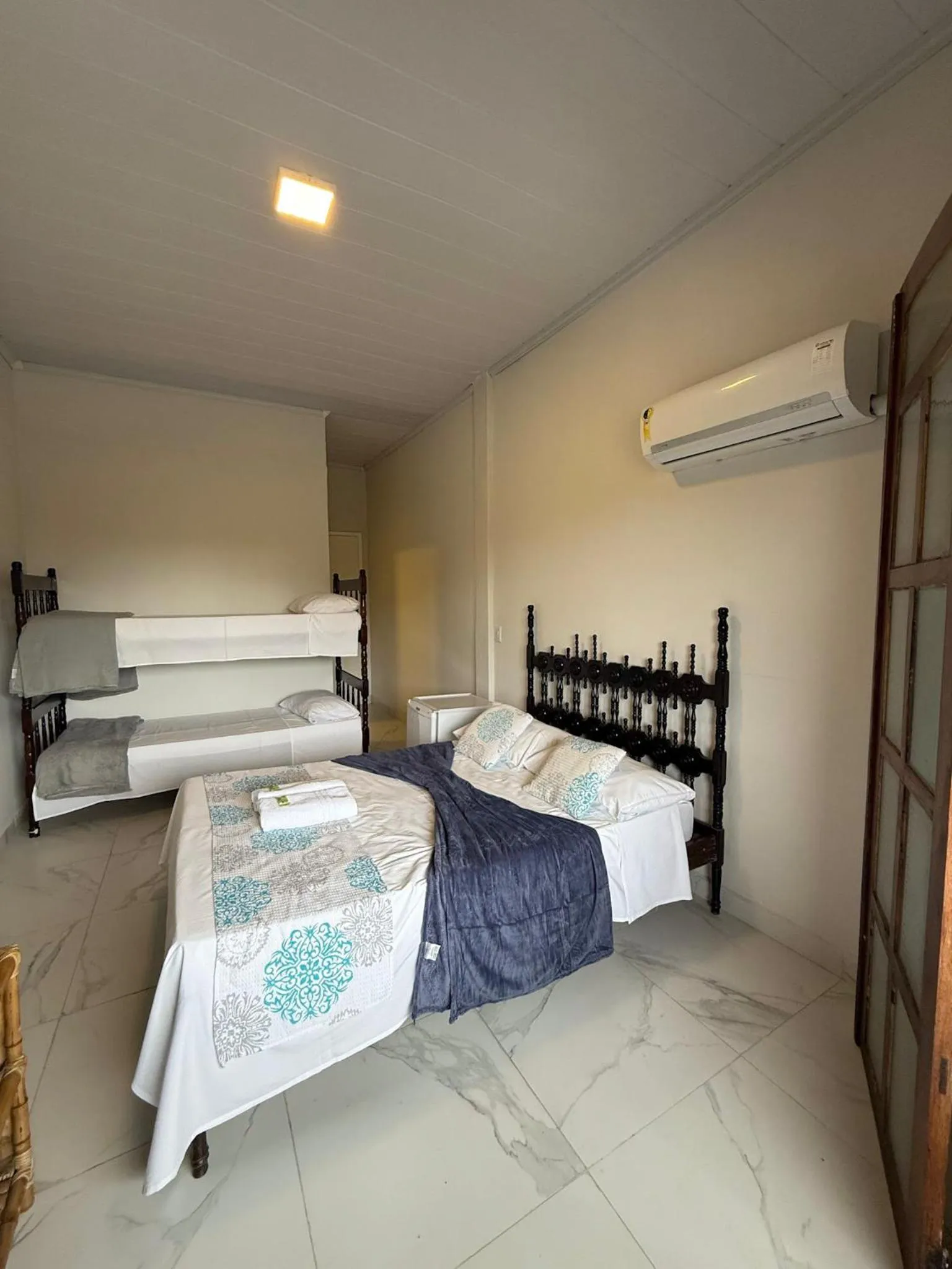 Bed in Pousada Lisamar