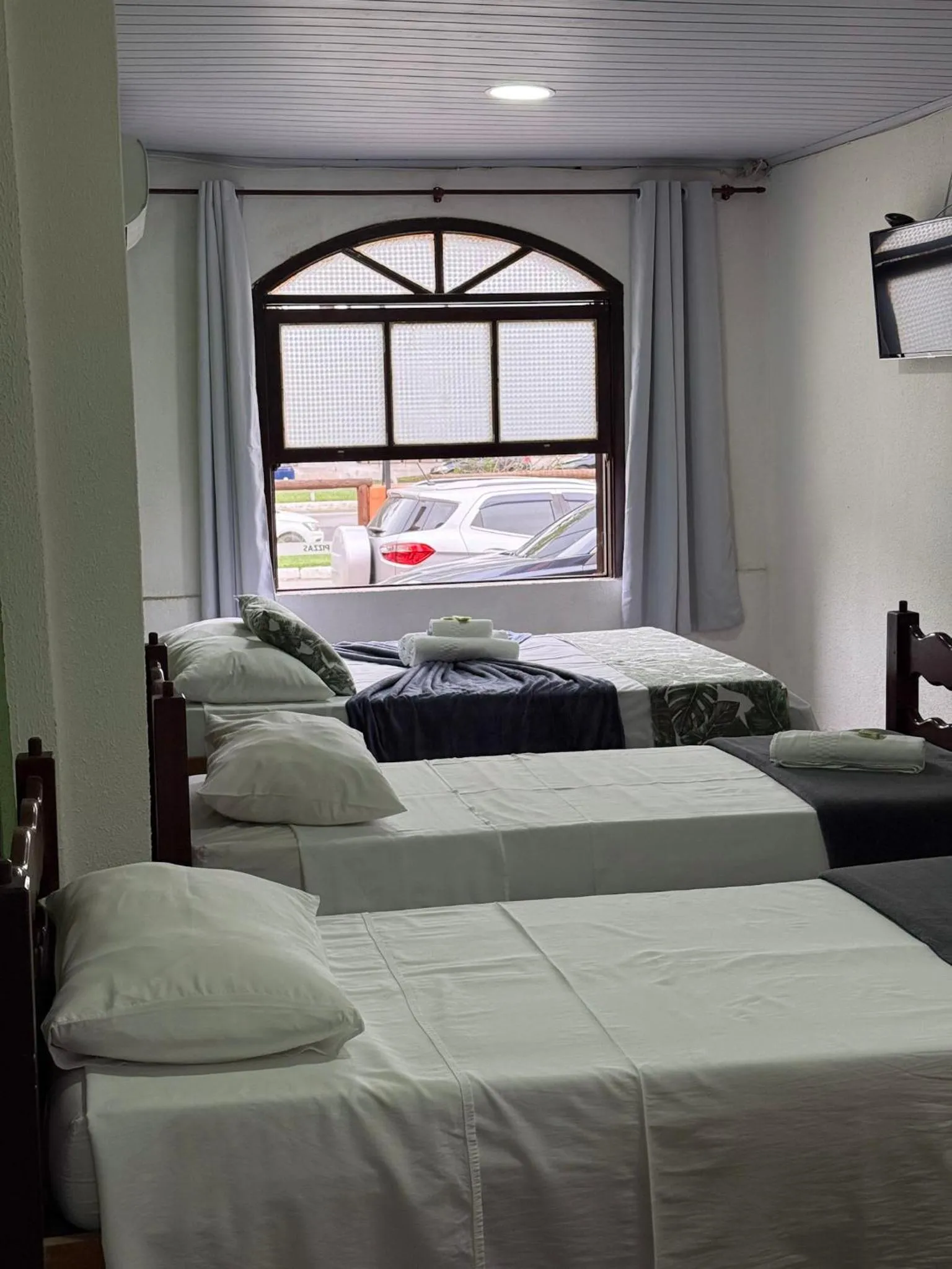 Bed in Pousada Lisamar