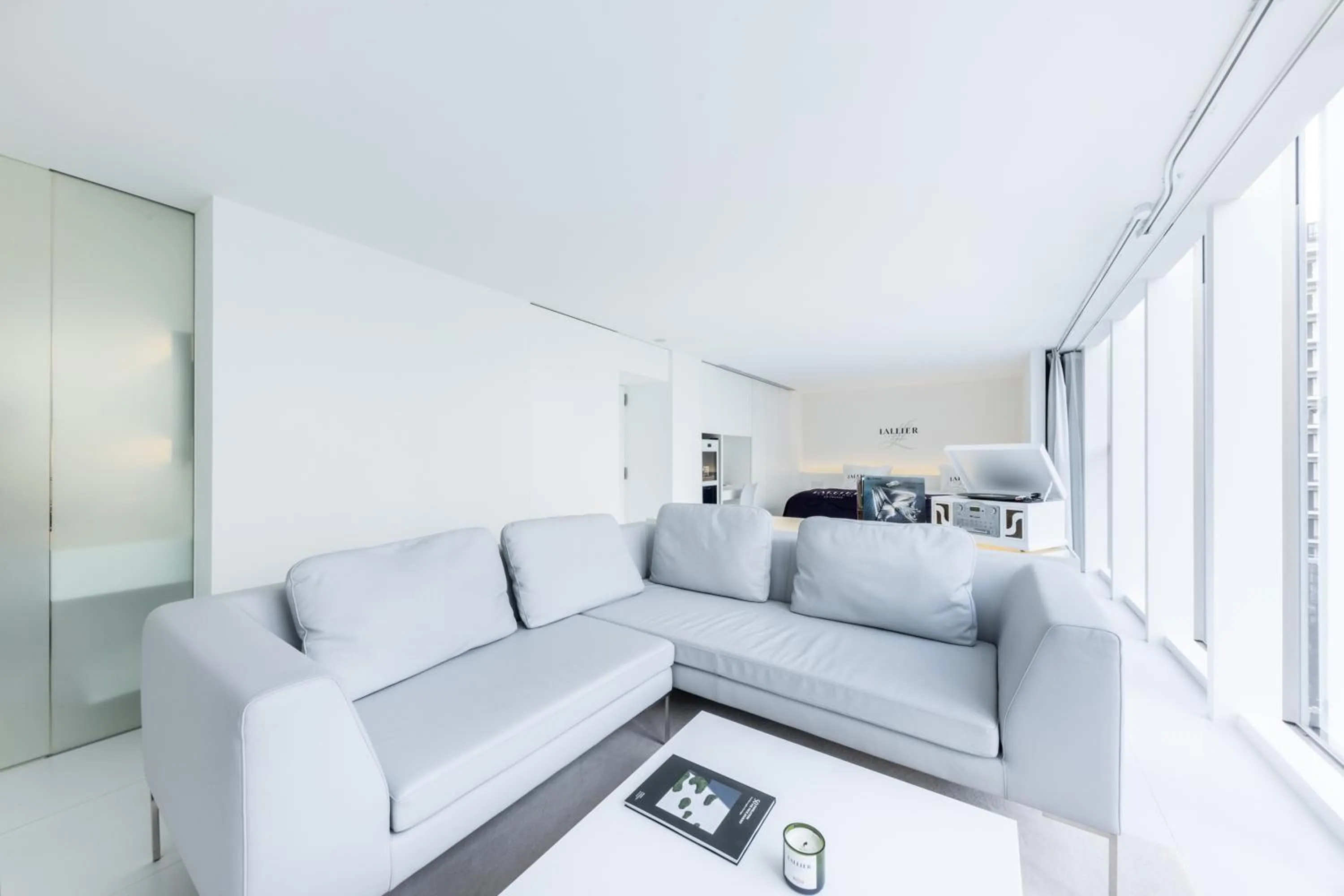 Living room in CUVEE J2 HOTEL OSAKA by Onko Chishin