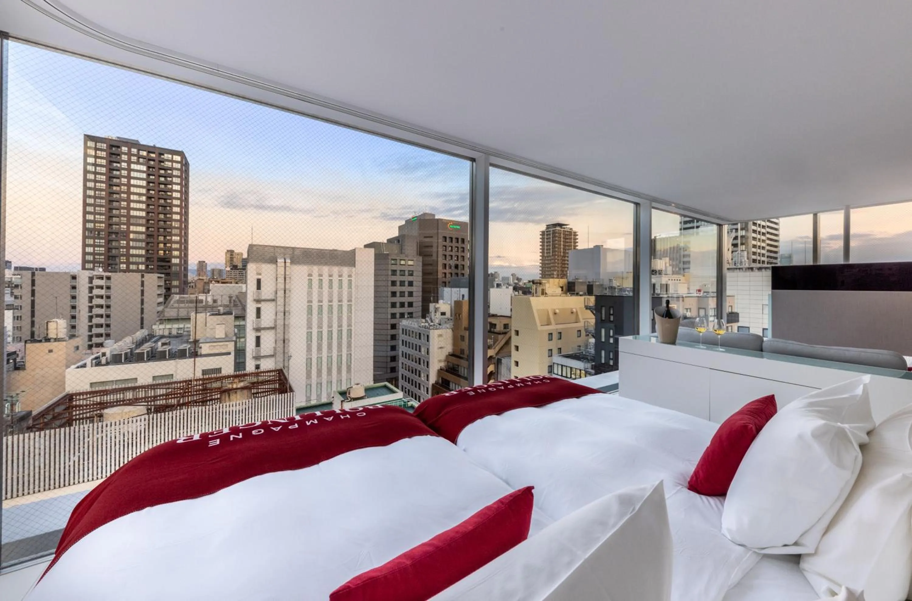 Bed in CUVEE J2 HOTEL OSAKA by Onko Chishin