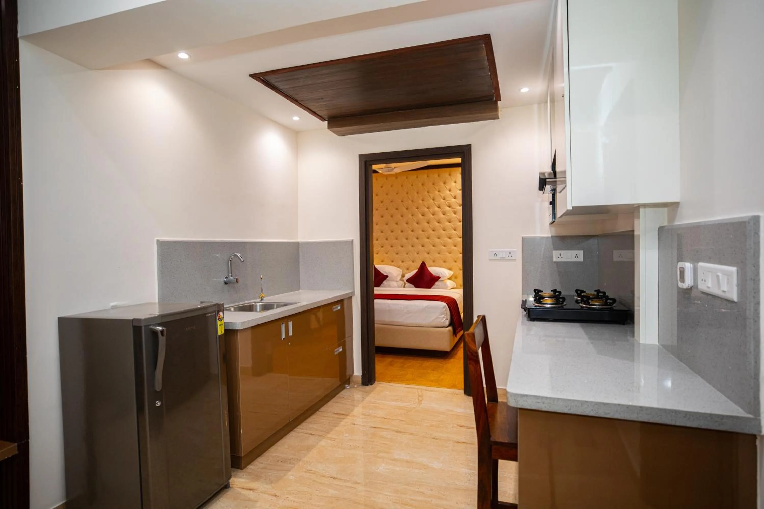 Kitchen or kitchenette, Bed in Hotel Silver Clé
