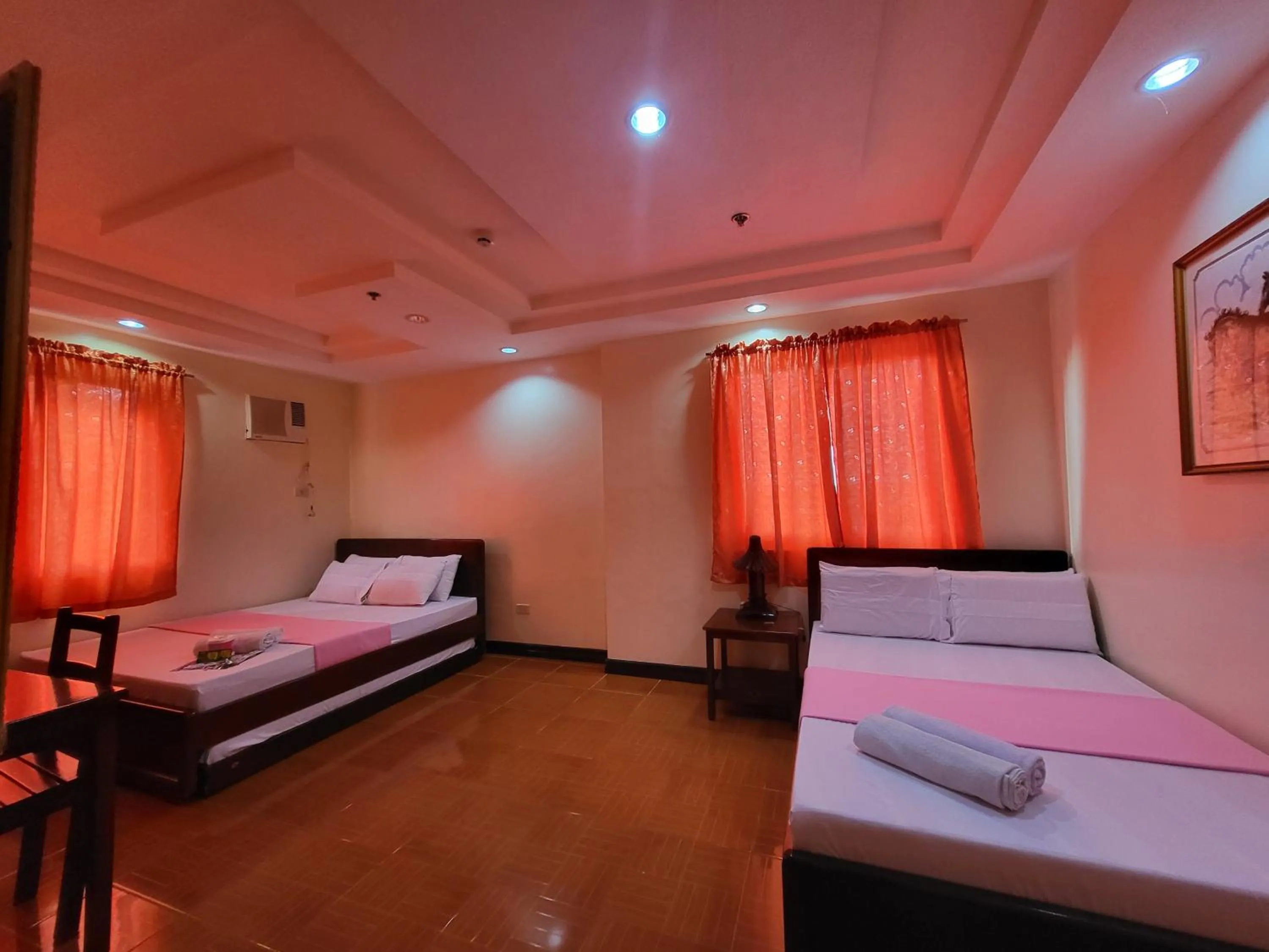 Standard Quadruple Room in Rooms R Us - Voyagers Palace