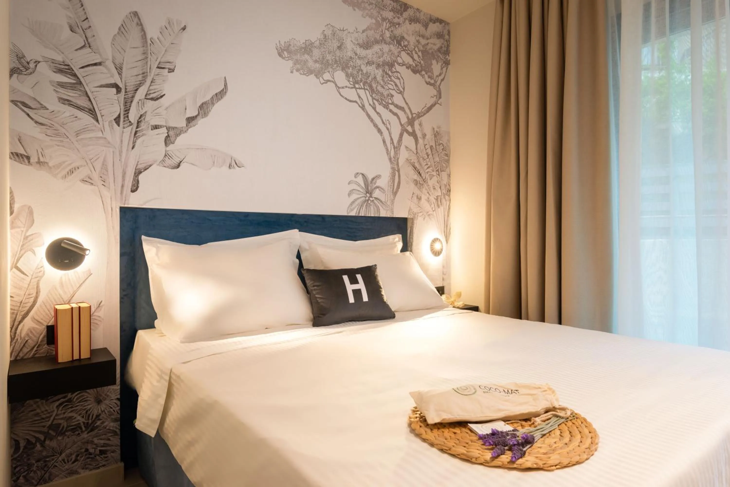 Bed in Hara Suites