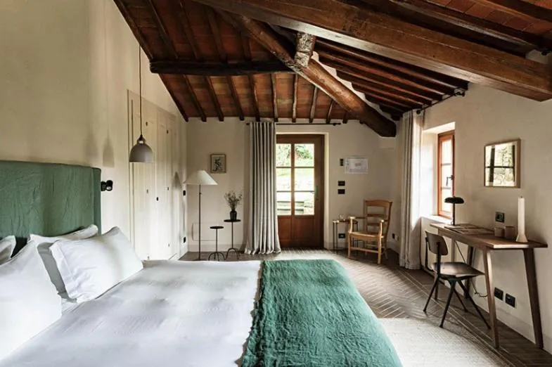 Bed in Pieve Aldina Relais & Châteaux