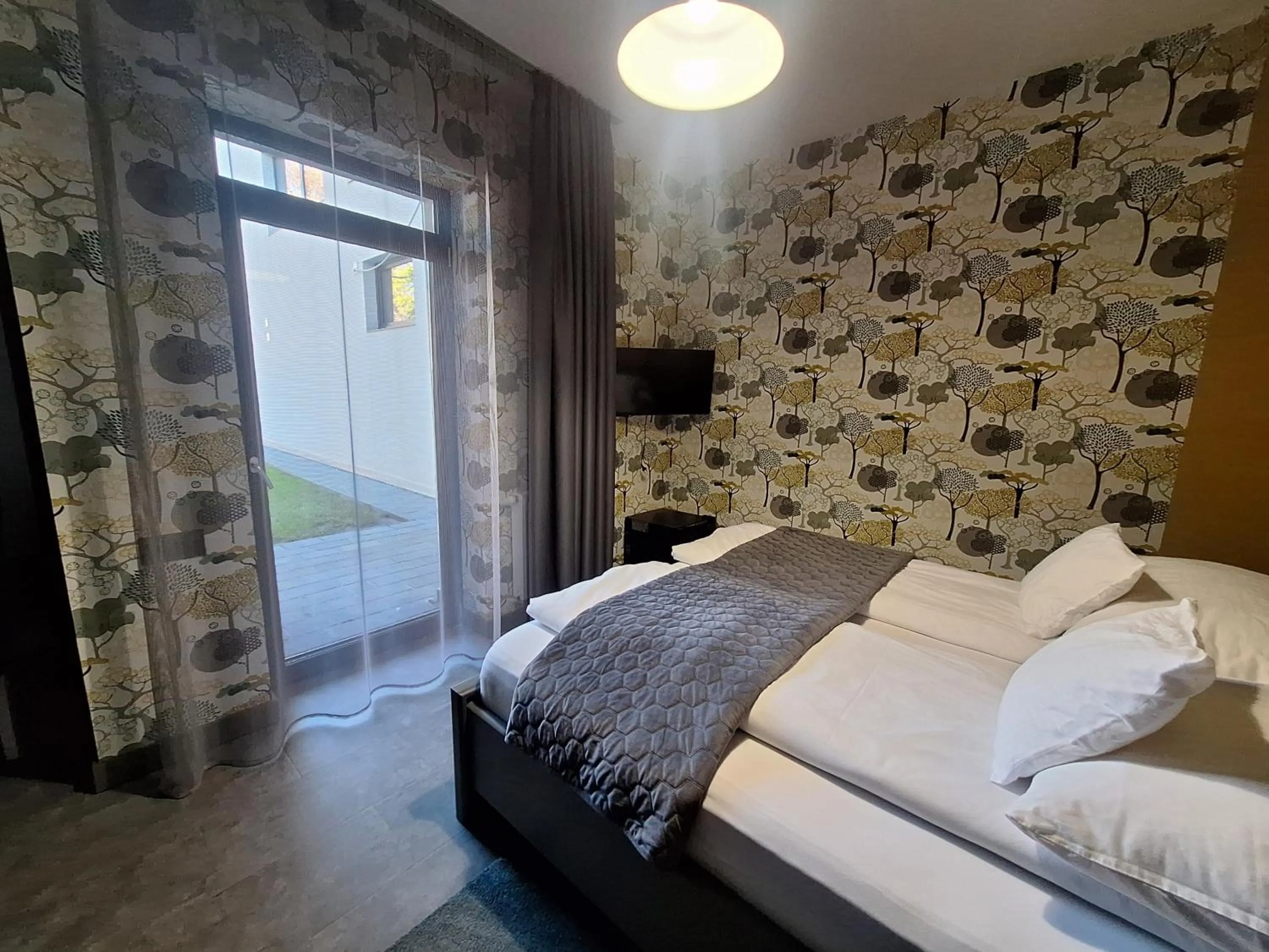 Bed in Ikonik Spa Hotel