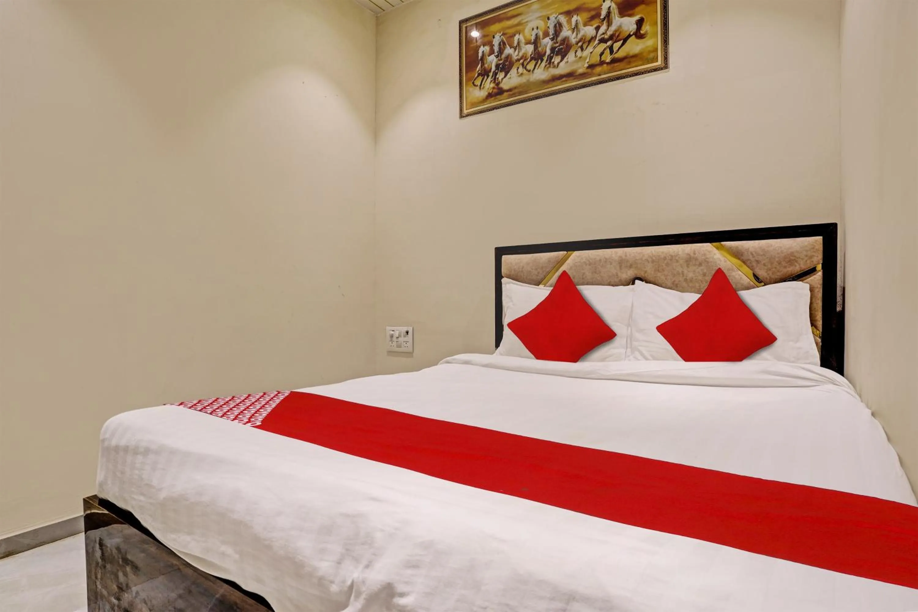 Bedroom in Hotel O NK Grand