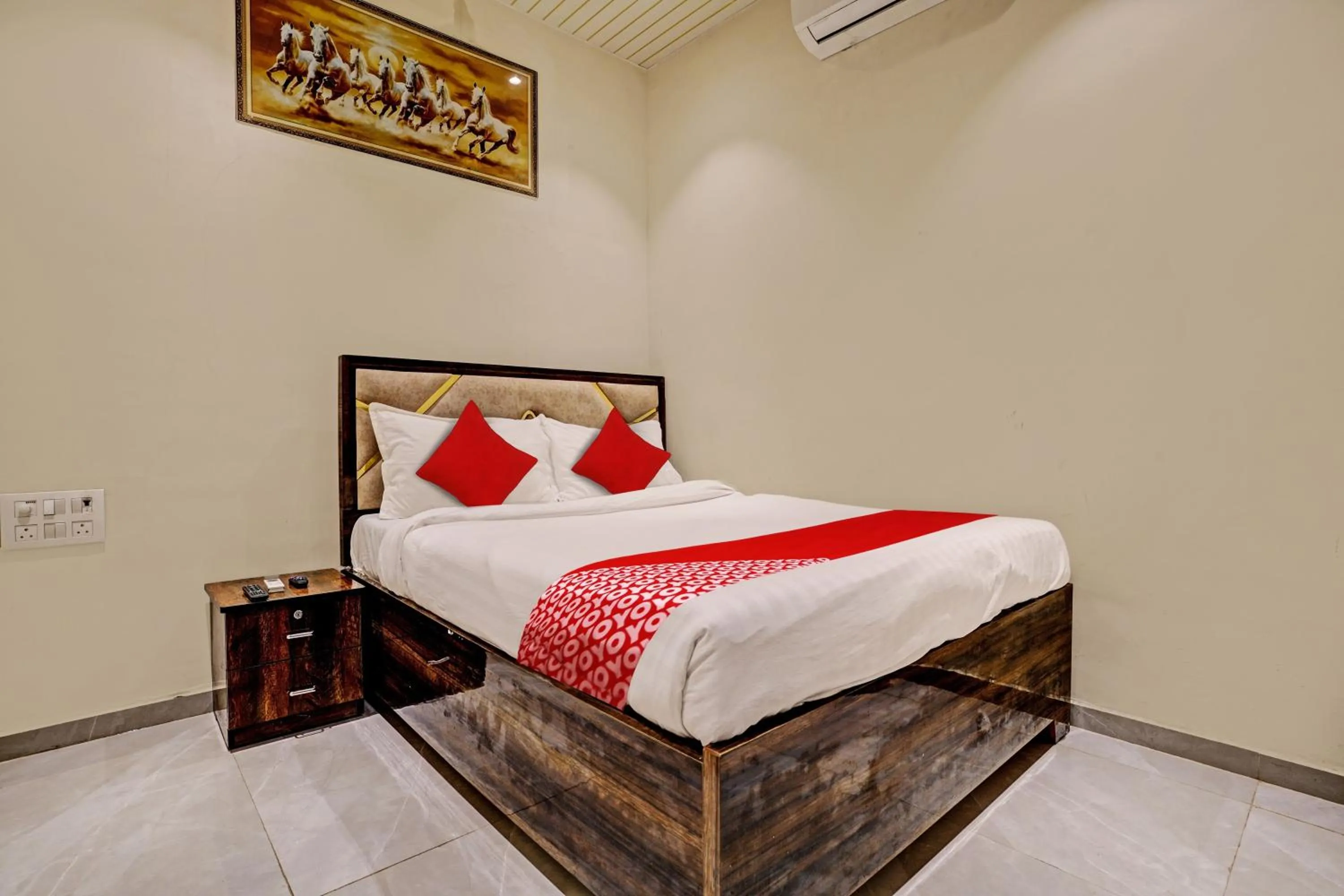 Bedroom in Hotel O NK Grand