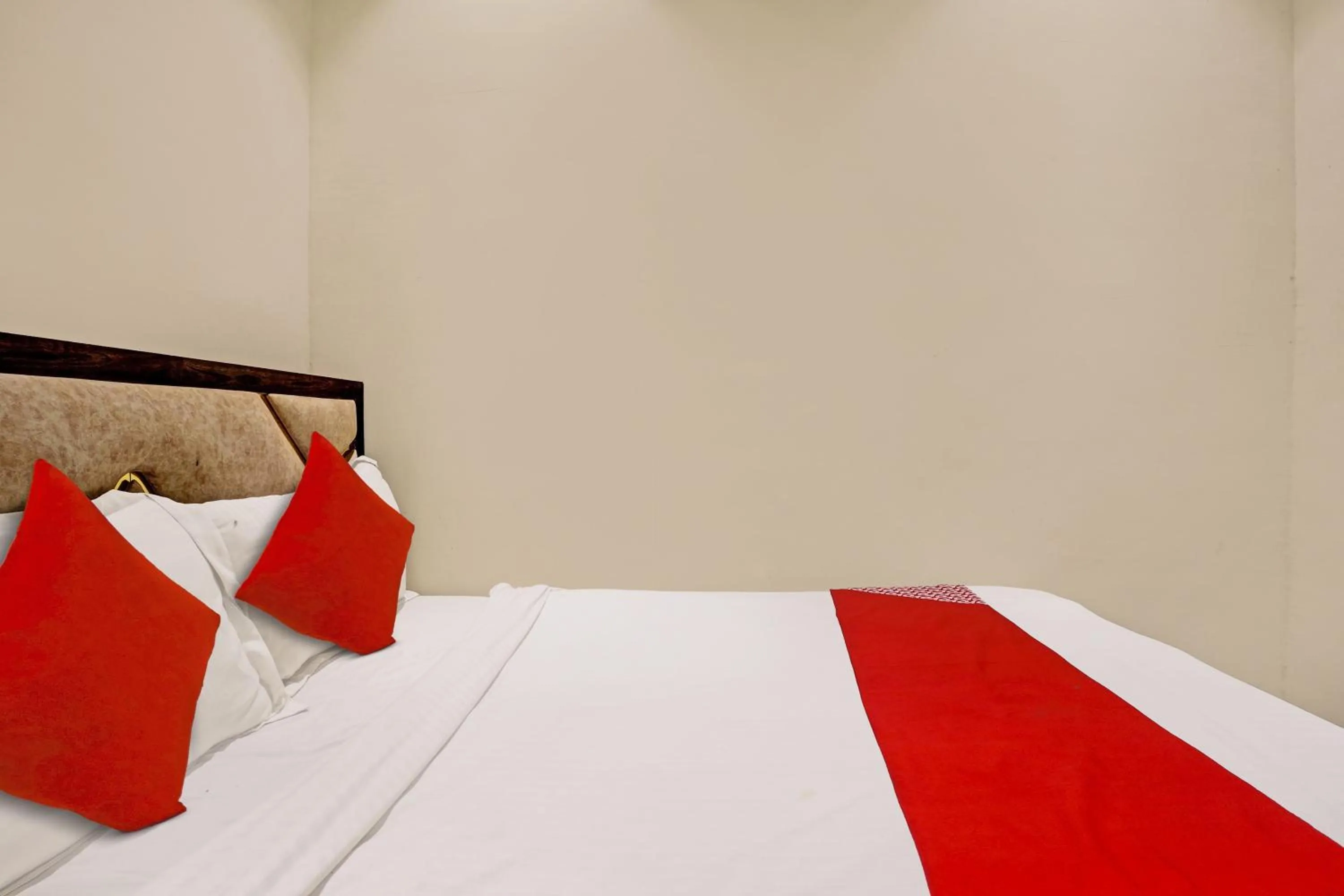 Bedroom in Hotel O NK Grand