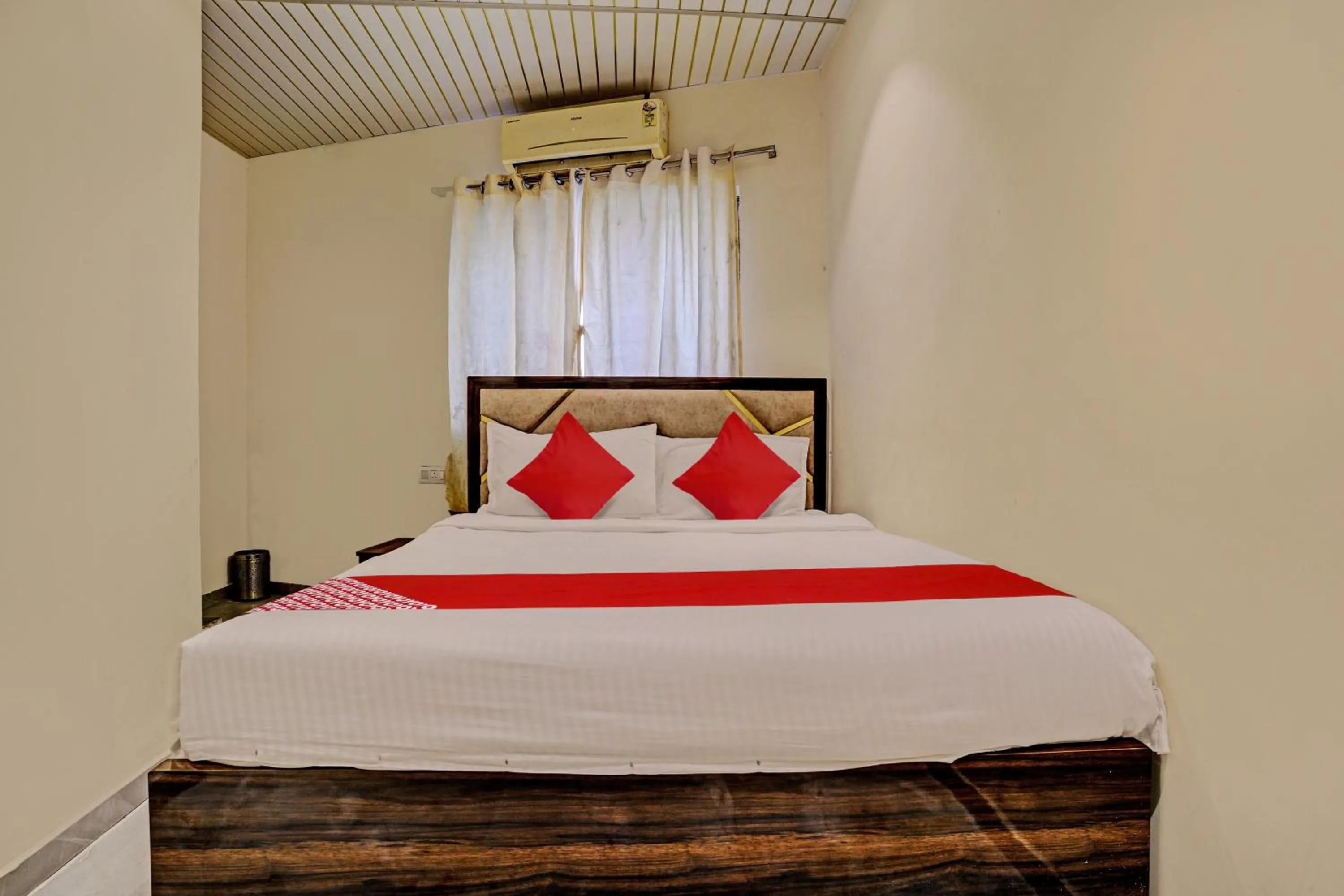 Bedroom in Hotel O NK Grand