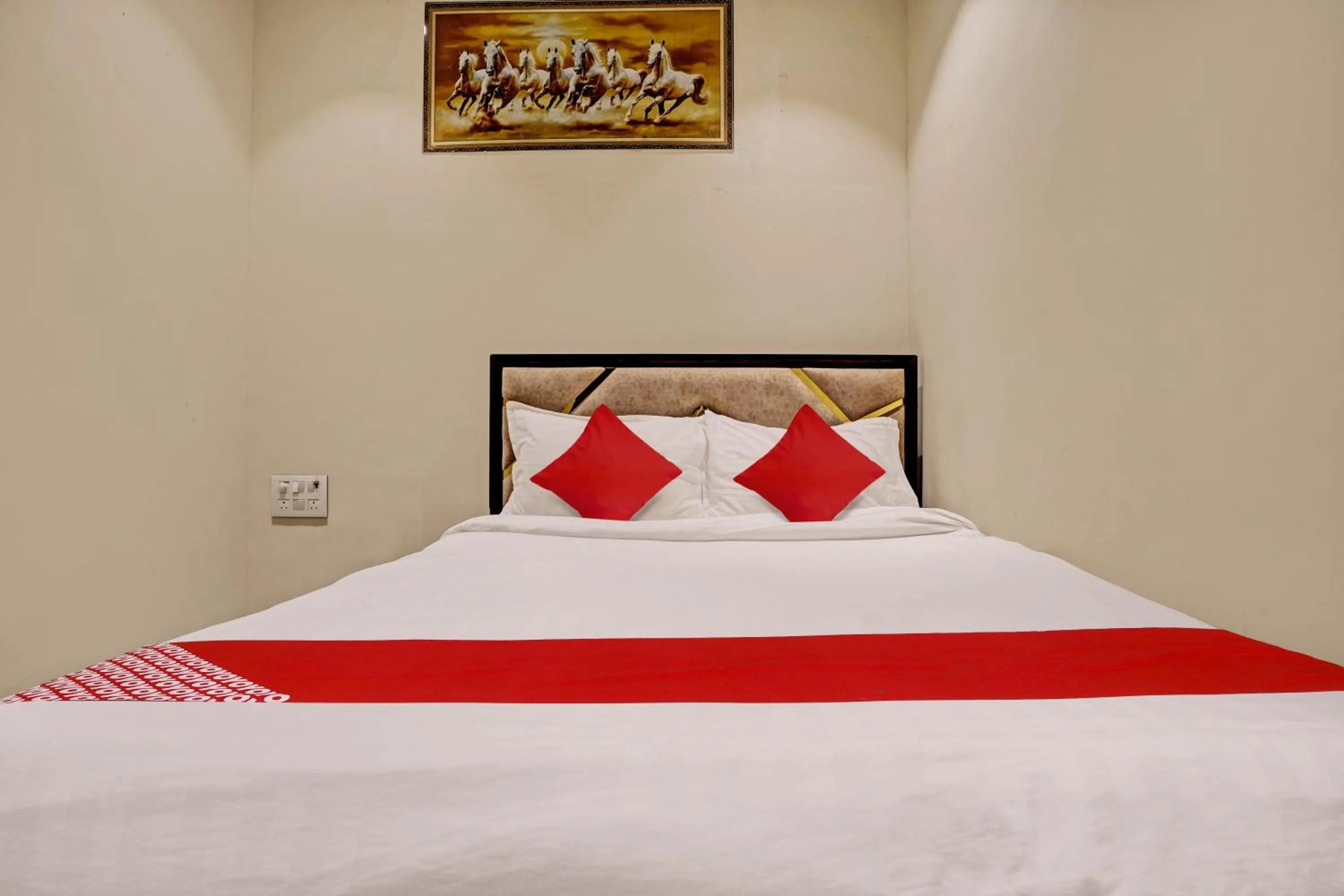 Bedroom in Hotel O NK Grand