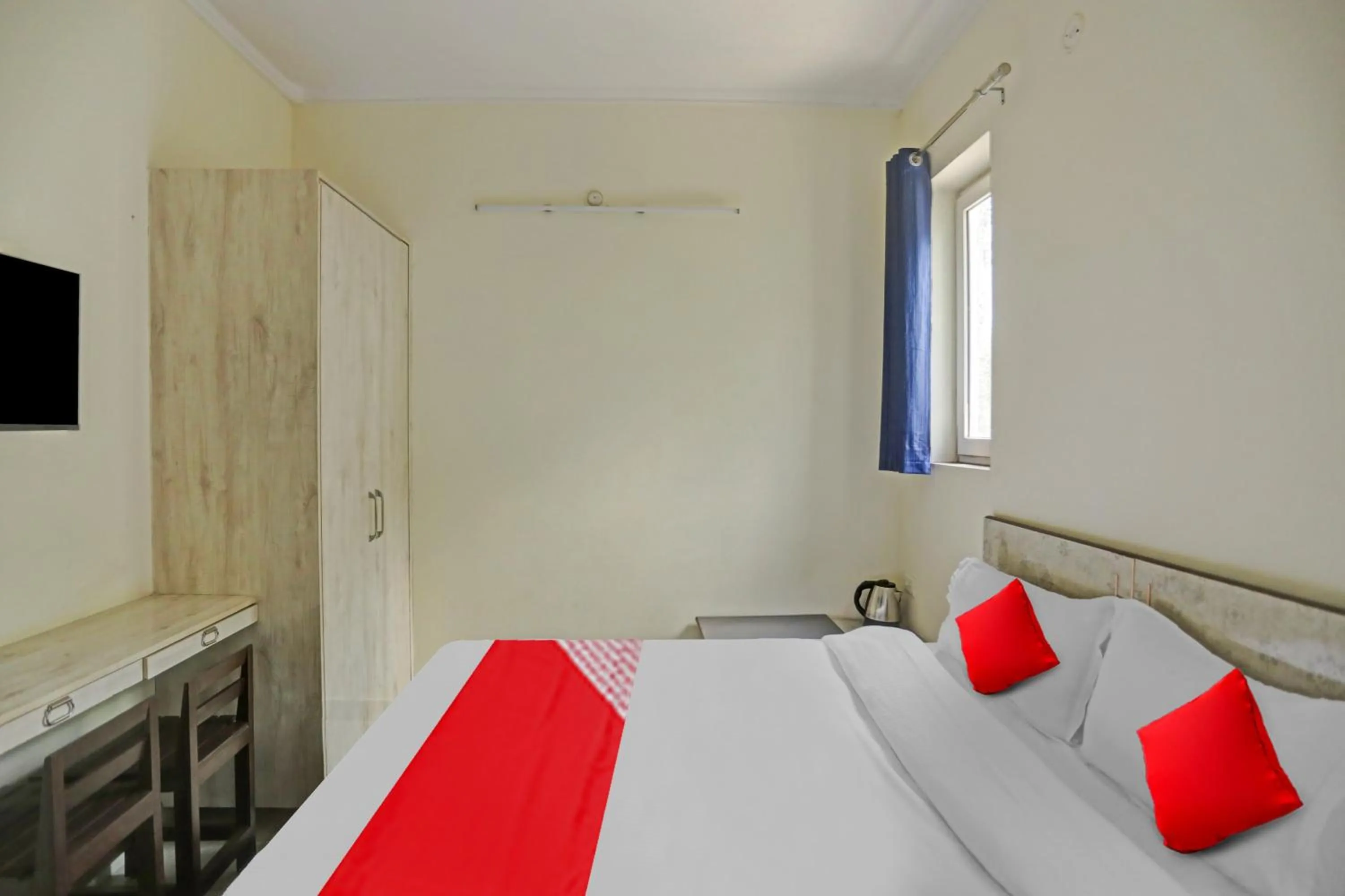 Bedroom in Hotel O by OYO Serene Escape