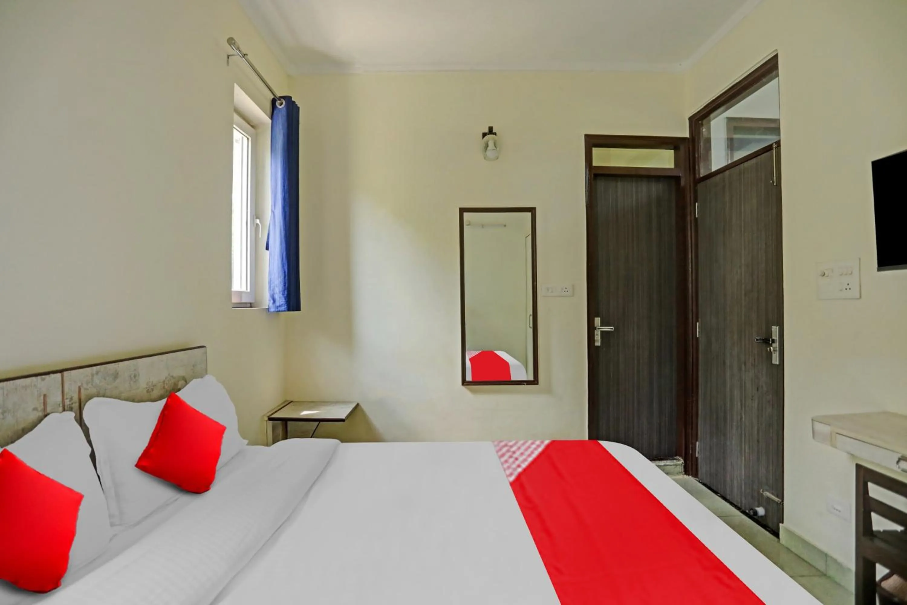 Bedroom in Hotel O by OYO Serene Escape