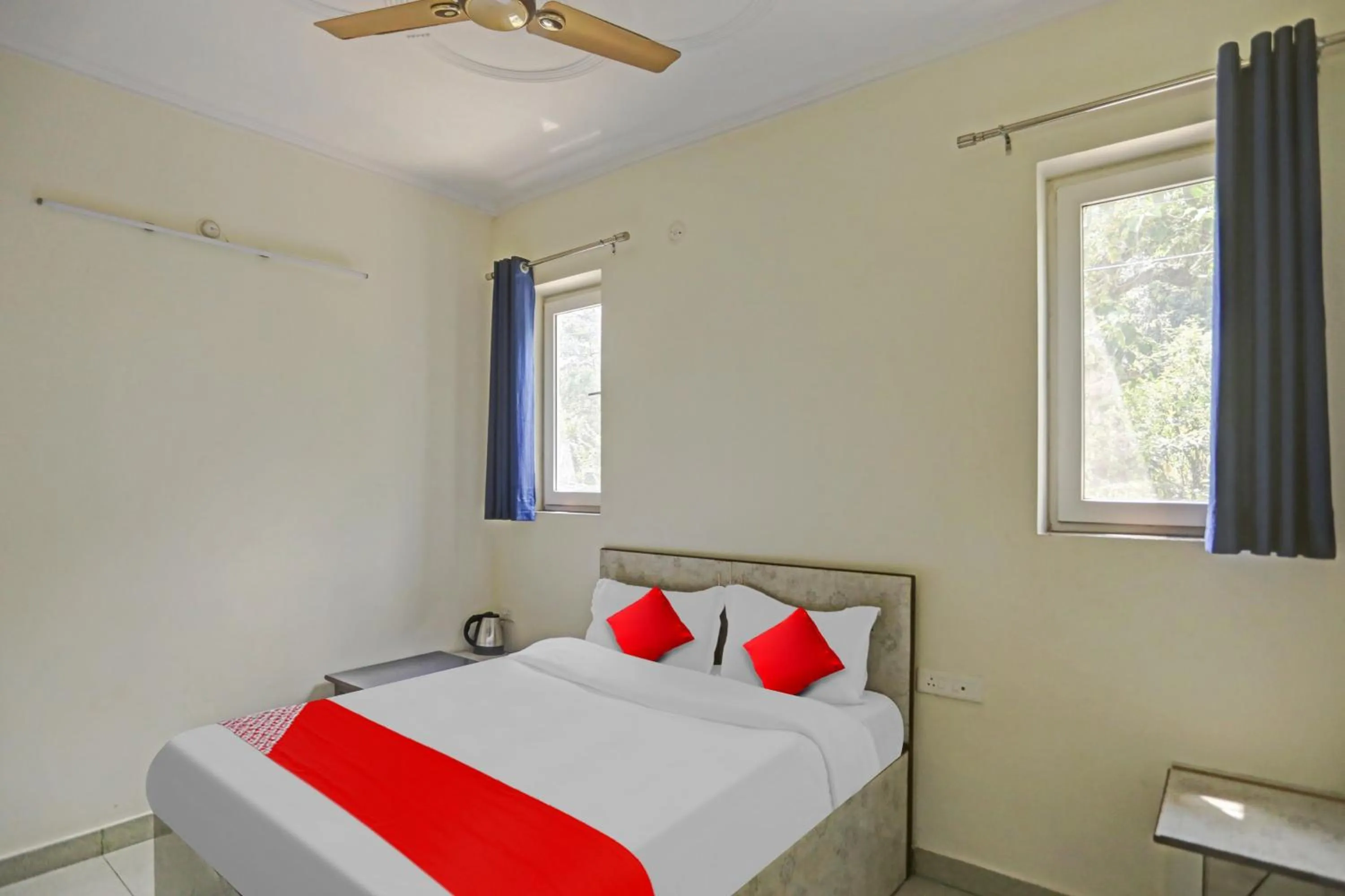 Bedroom in Hotel O by OYO Serene Escape