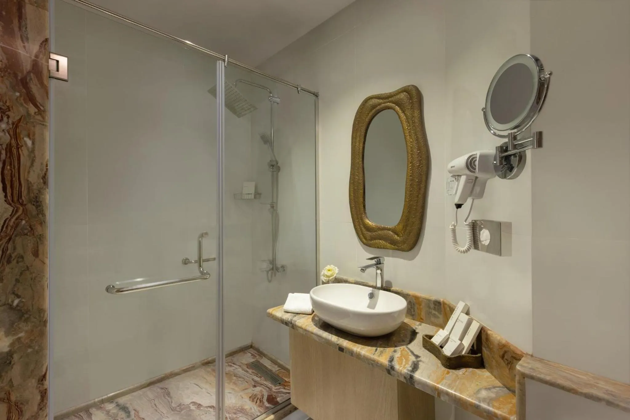 Bathroom in Crowne Plaza Alexandria Mirage by IHG