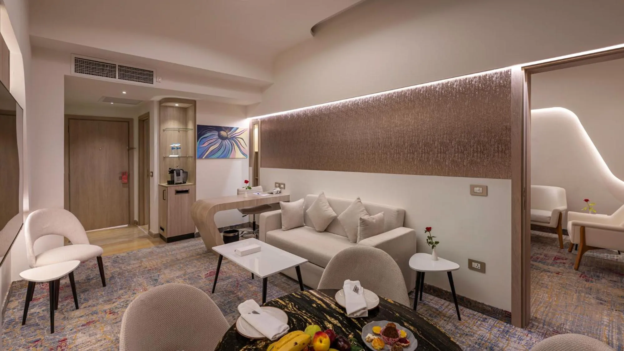 Living room in Crowne Plaza Alexandria Mirage by IHG