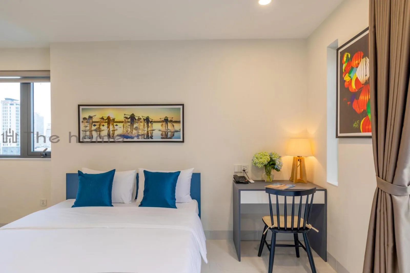 Bed in The Home Hotel & Apartment