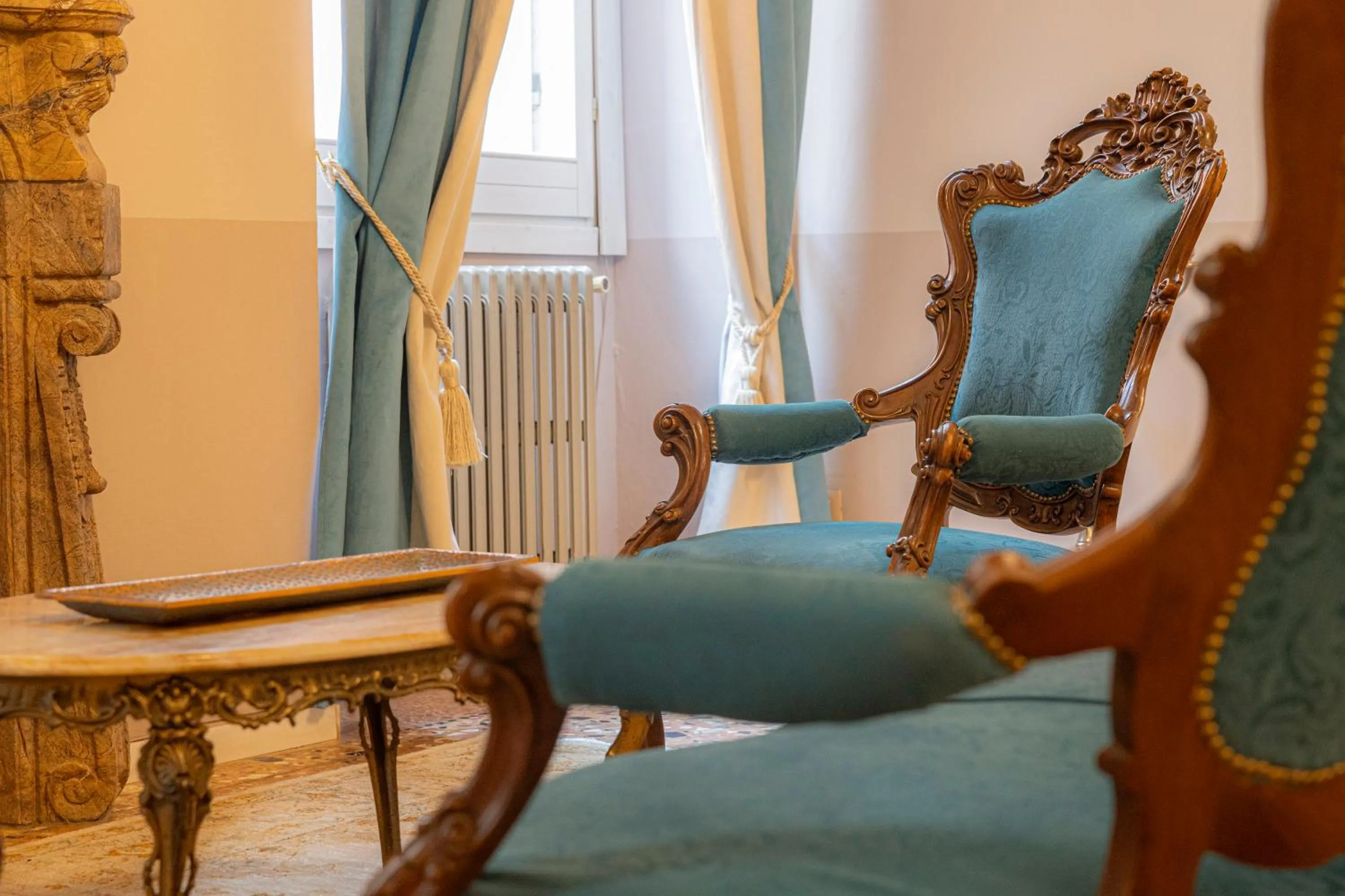 Seating area in Corte Realdi - Palazzo Camozzini