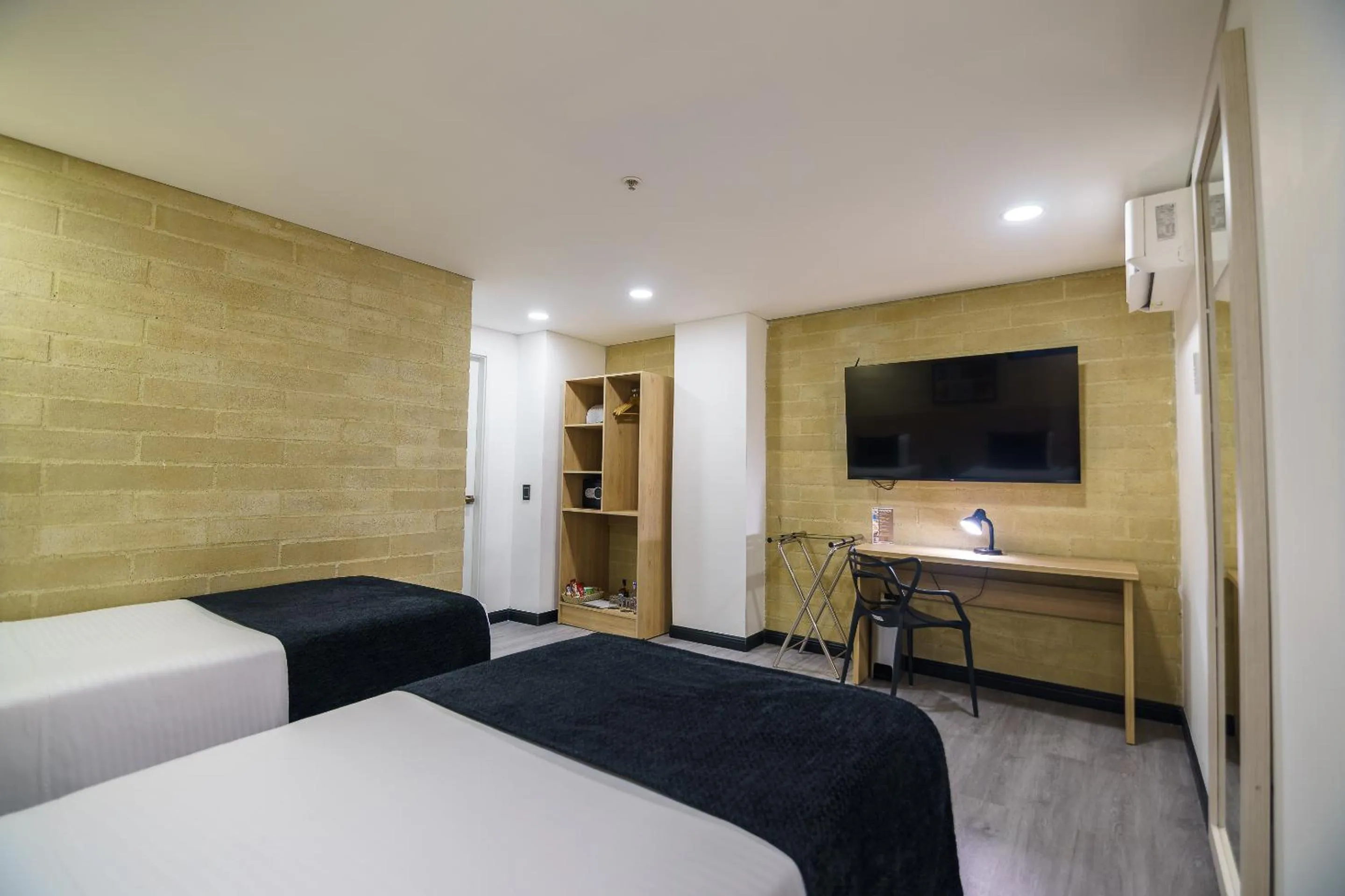 Photo of the whole room, Bed in First Class Hotel