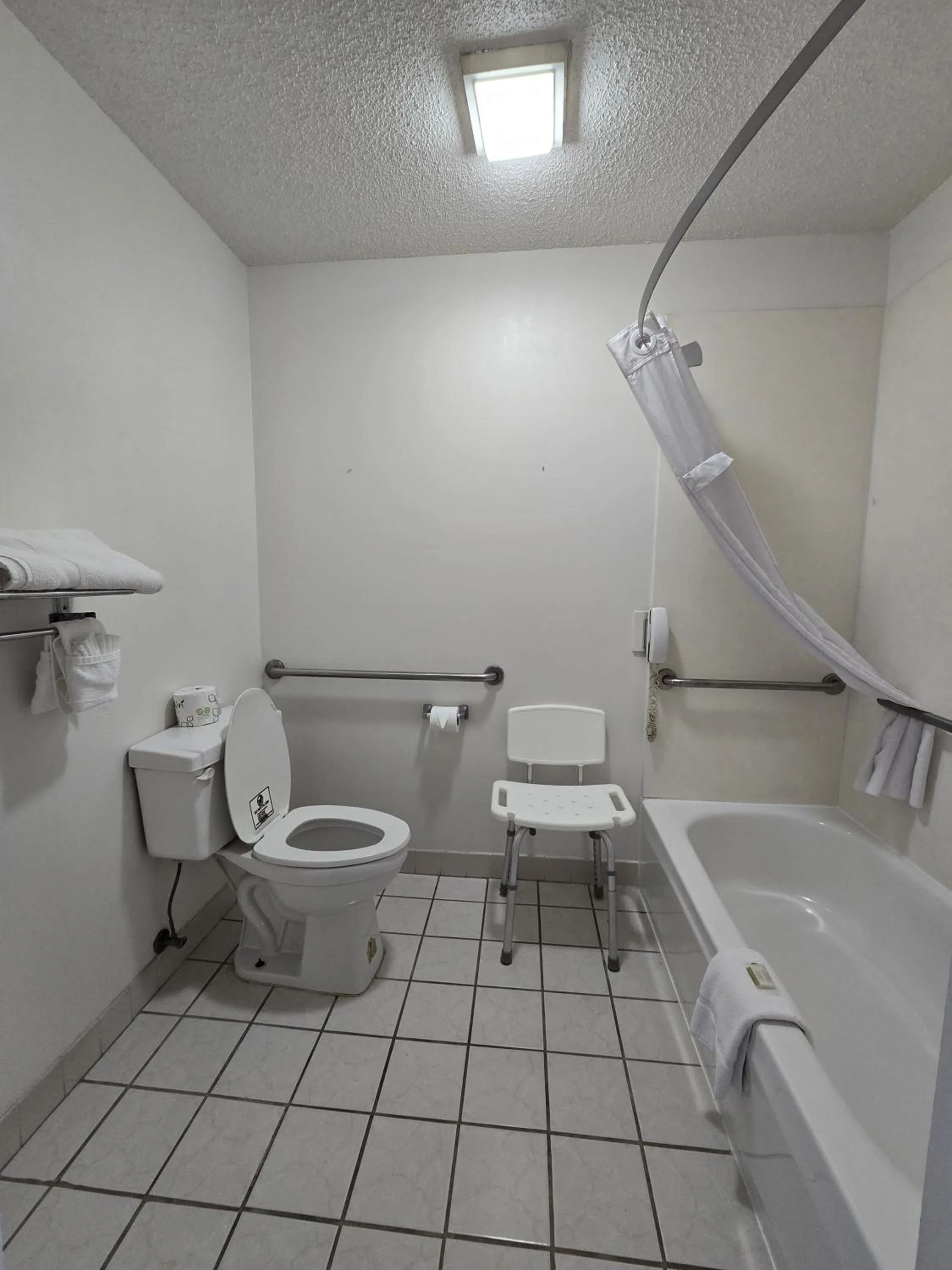 Toilet in Super 8 by Wyndham Arkadelphia Caddo Valley Area