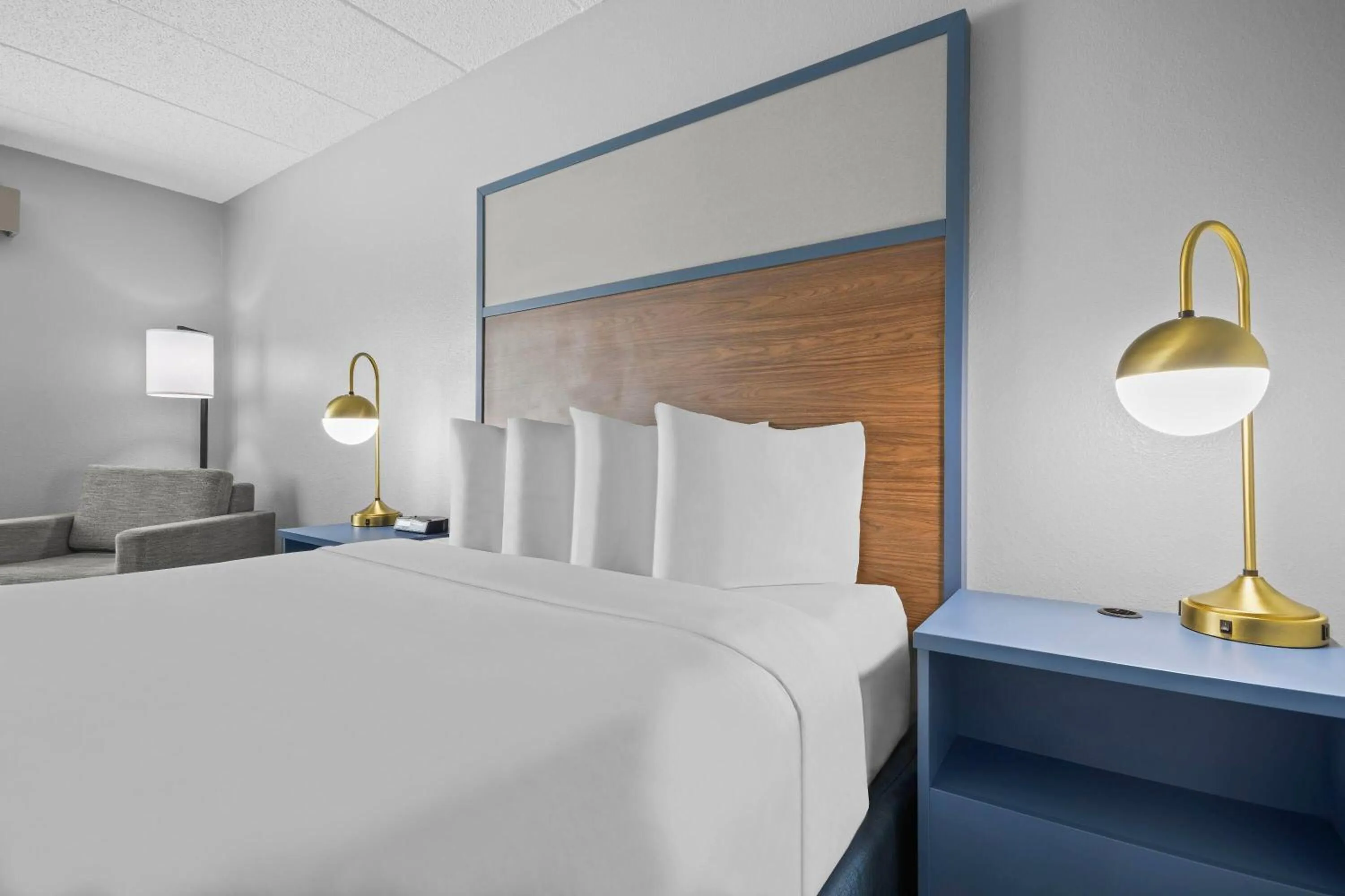 Bed in AmericInn by Wyndham Virginia