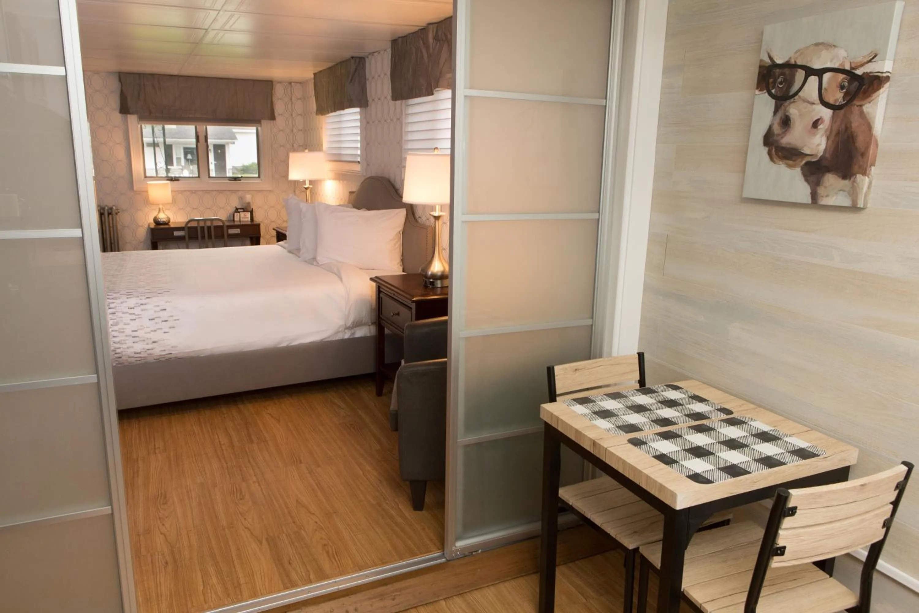 Photo of the whole room, Bed in Knotty Pine Motel