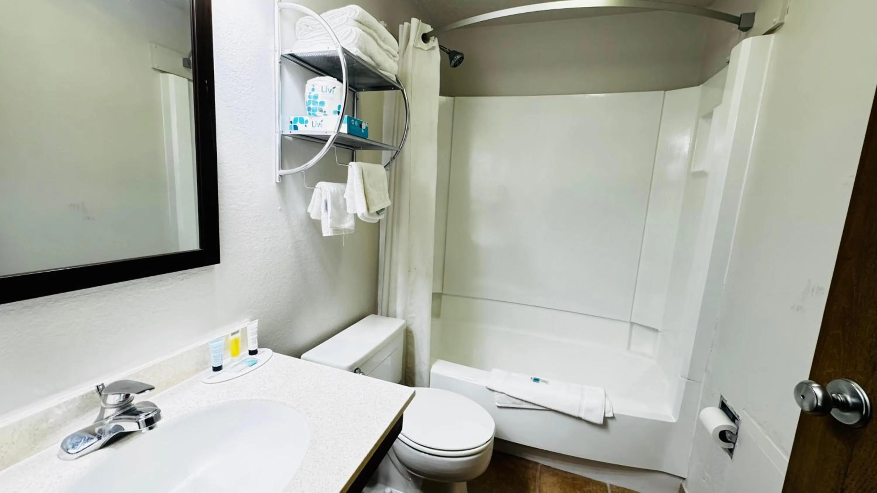 Bathroom in Super 8 by Wyndham North Platte