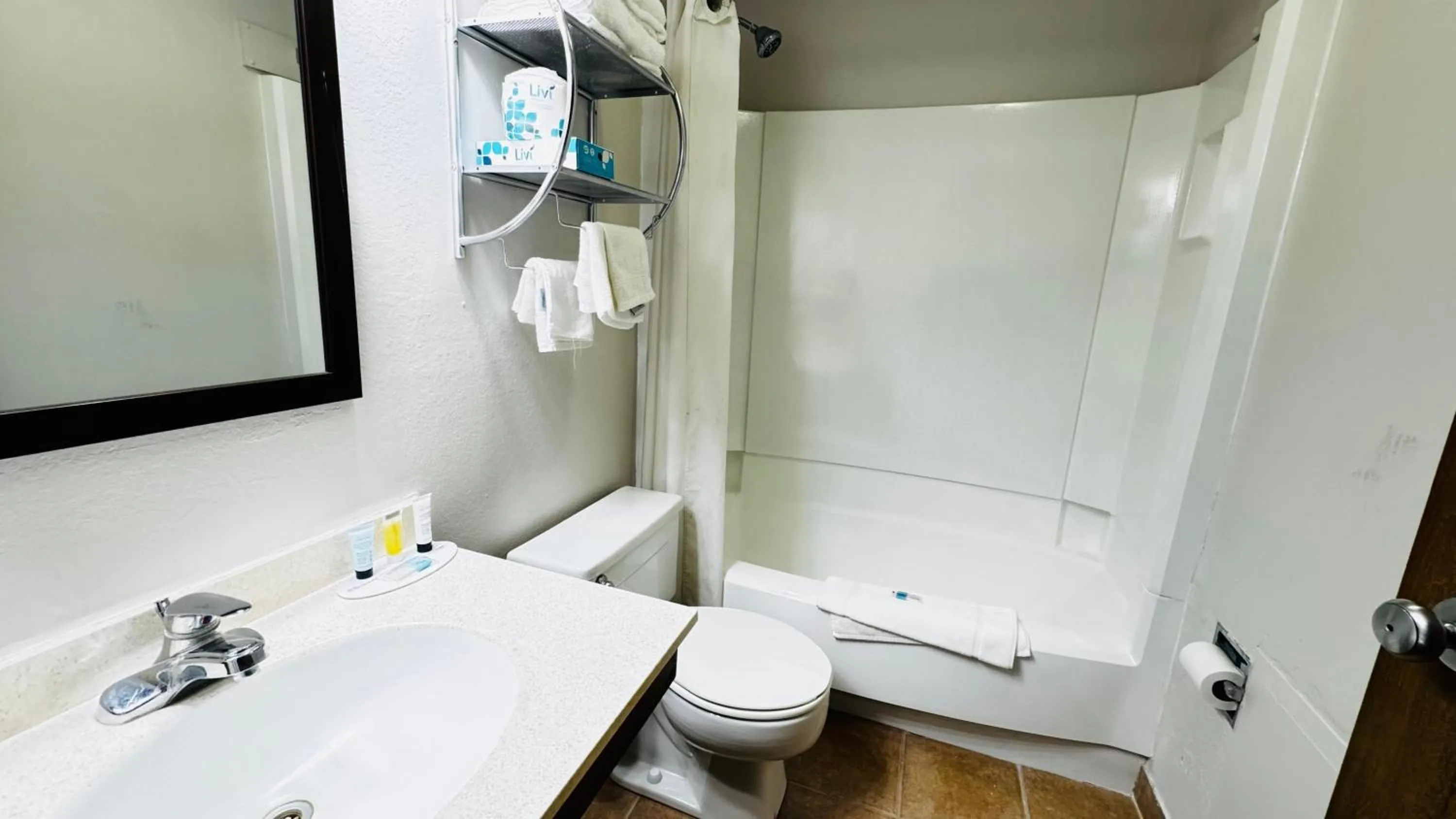 Bathroom in Super 8 by Wyndham North Platte