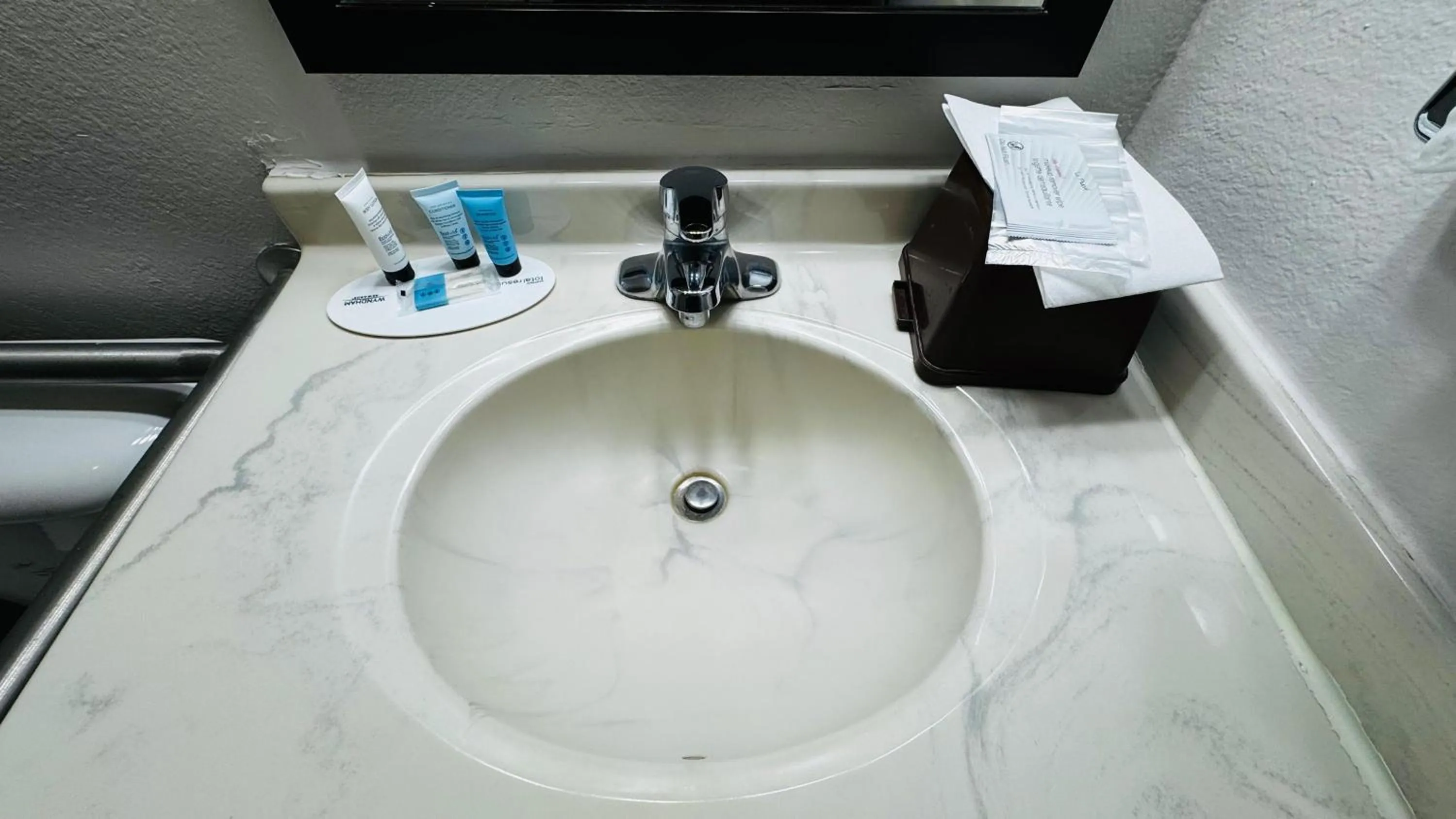 Bathroom in Super 8 by Wyndham North Platte