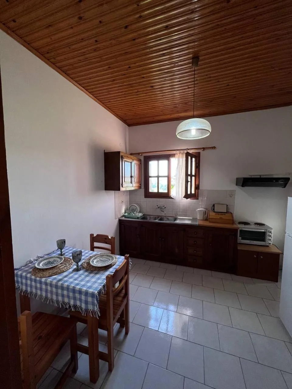 Kitchen or kitchenette in Gian Petro Apartments