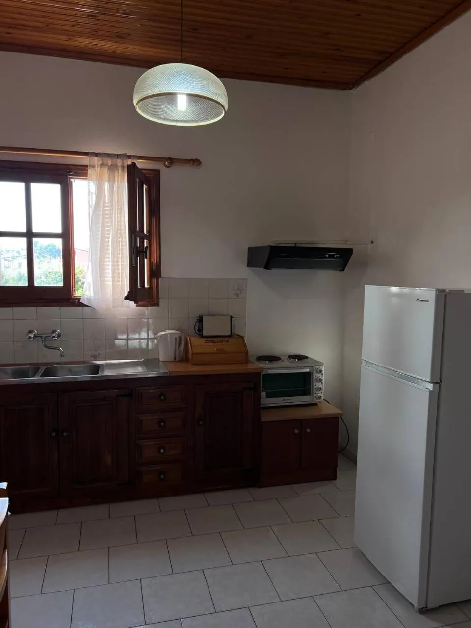 Kitchen or kitchenette in Gian Petro Apartments