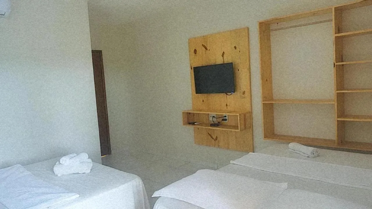 Bed in Tambazulik Pousada Maragogi