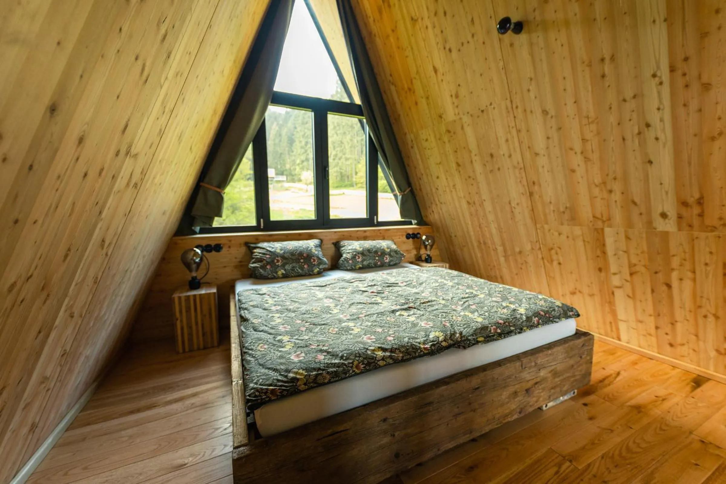 Bed in Baumhausapartment