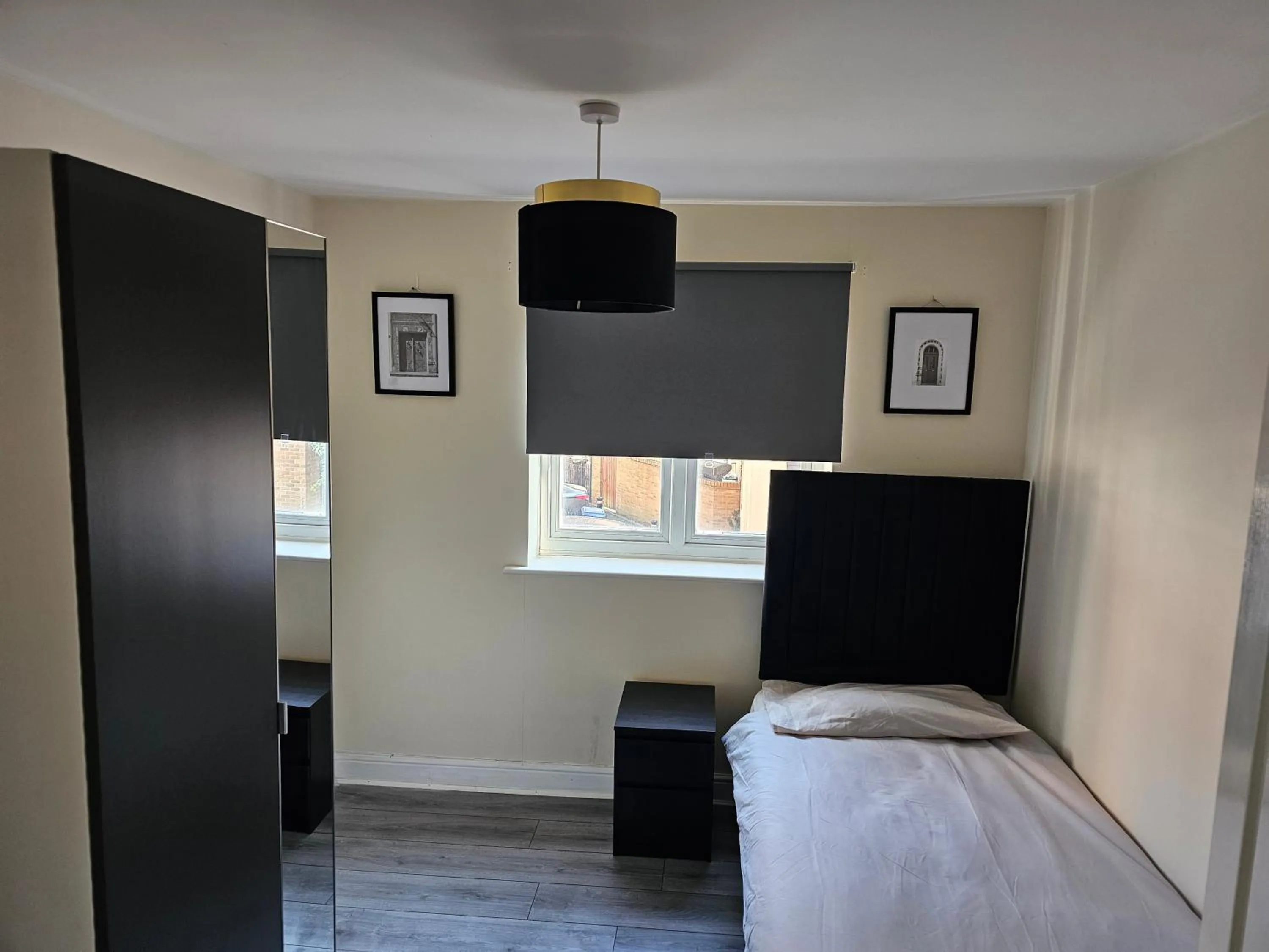 Bed in Sleek 4 bed Apartment with 2 bathrooms