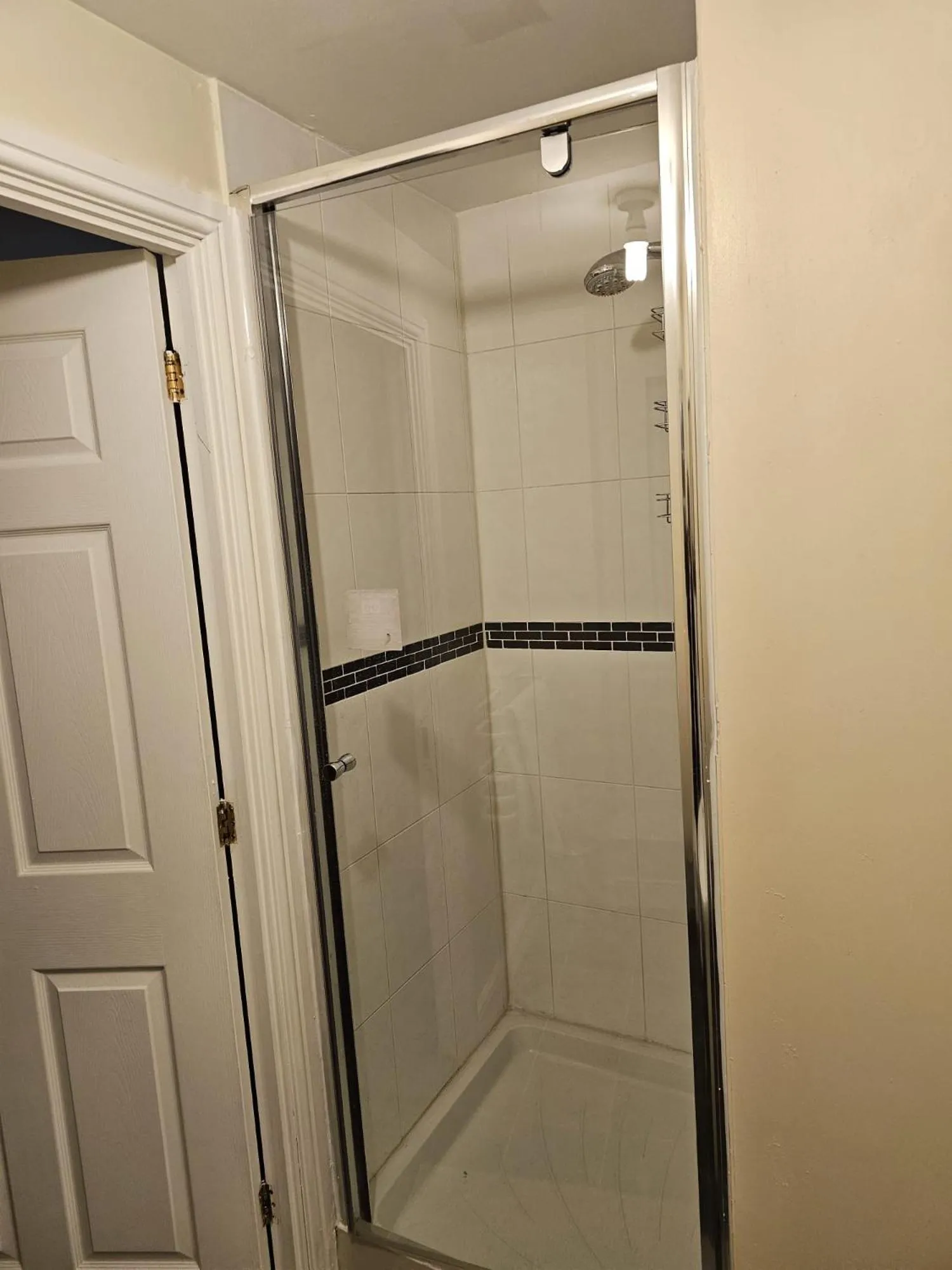 Shower in Sleek 4 bed Apartment with 2 bathrooms
