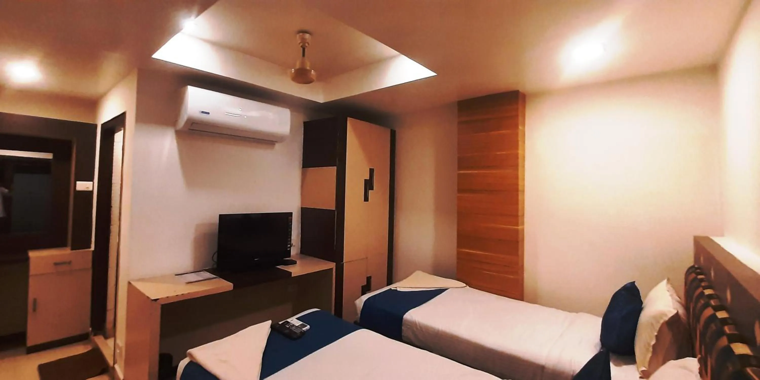 Bed in Hotel Kosala Vijayawada