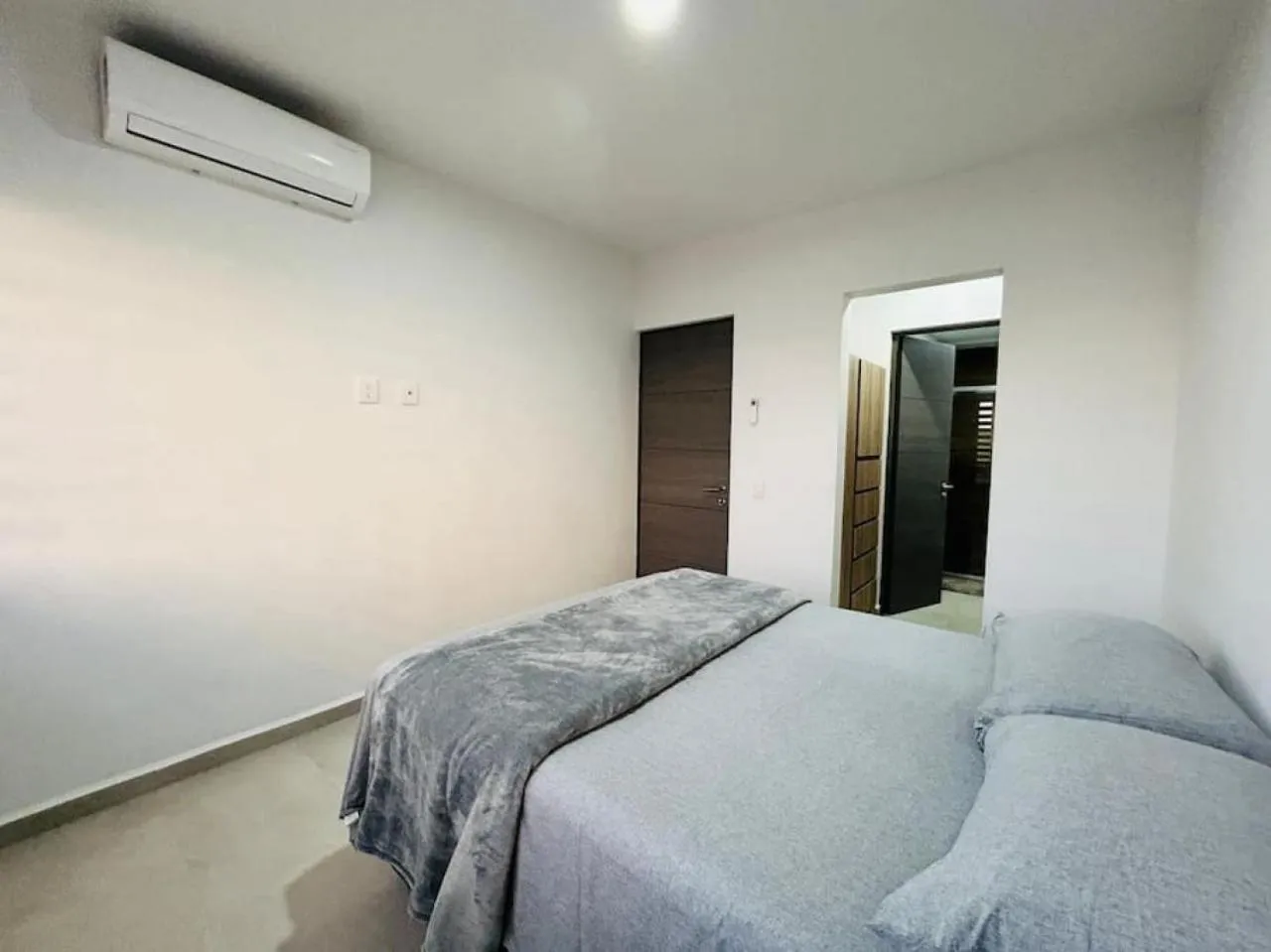 Bed in Bluú lagoon · Depa enorme alberca