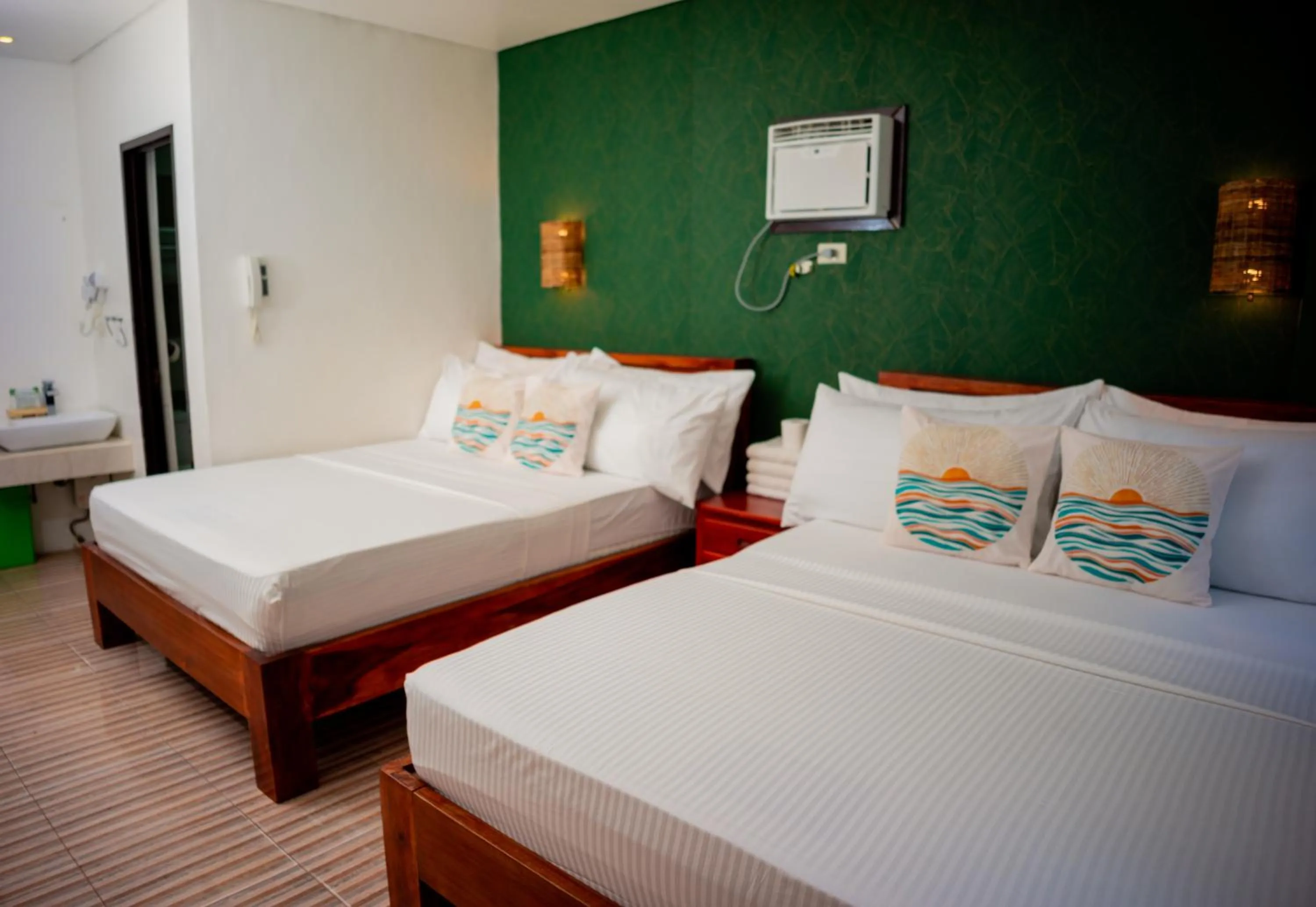 Bed in DENGI INN EL NIDO