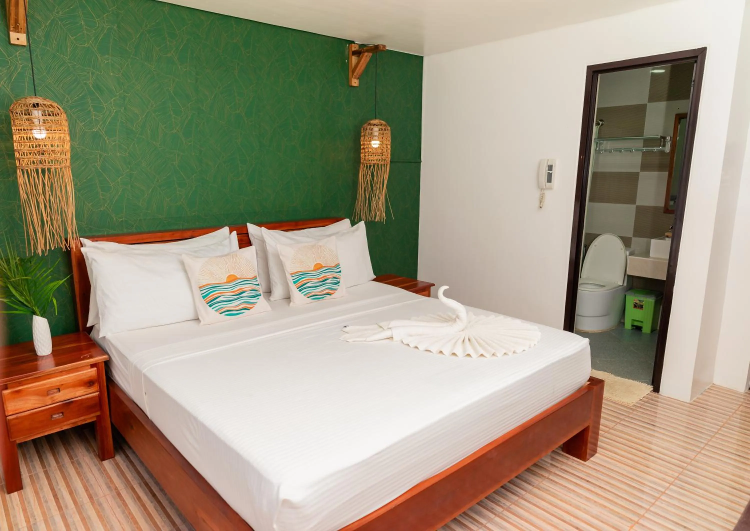 Bed in DENGI INN EL NIDO