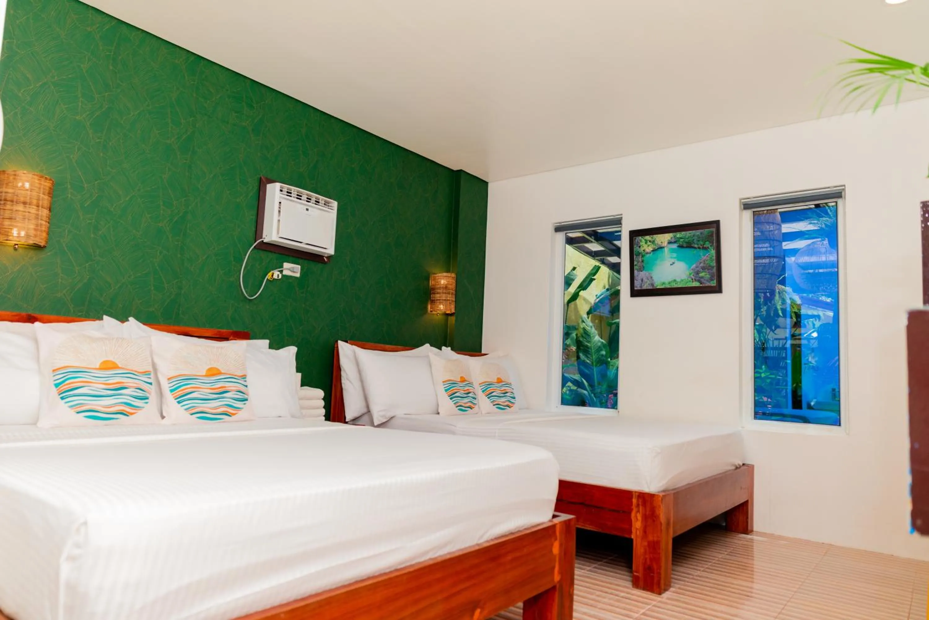 Bed in DENGI INN EL NIDO