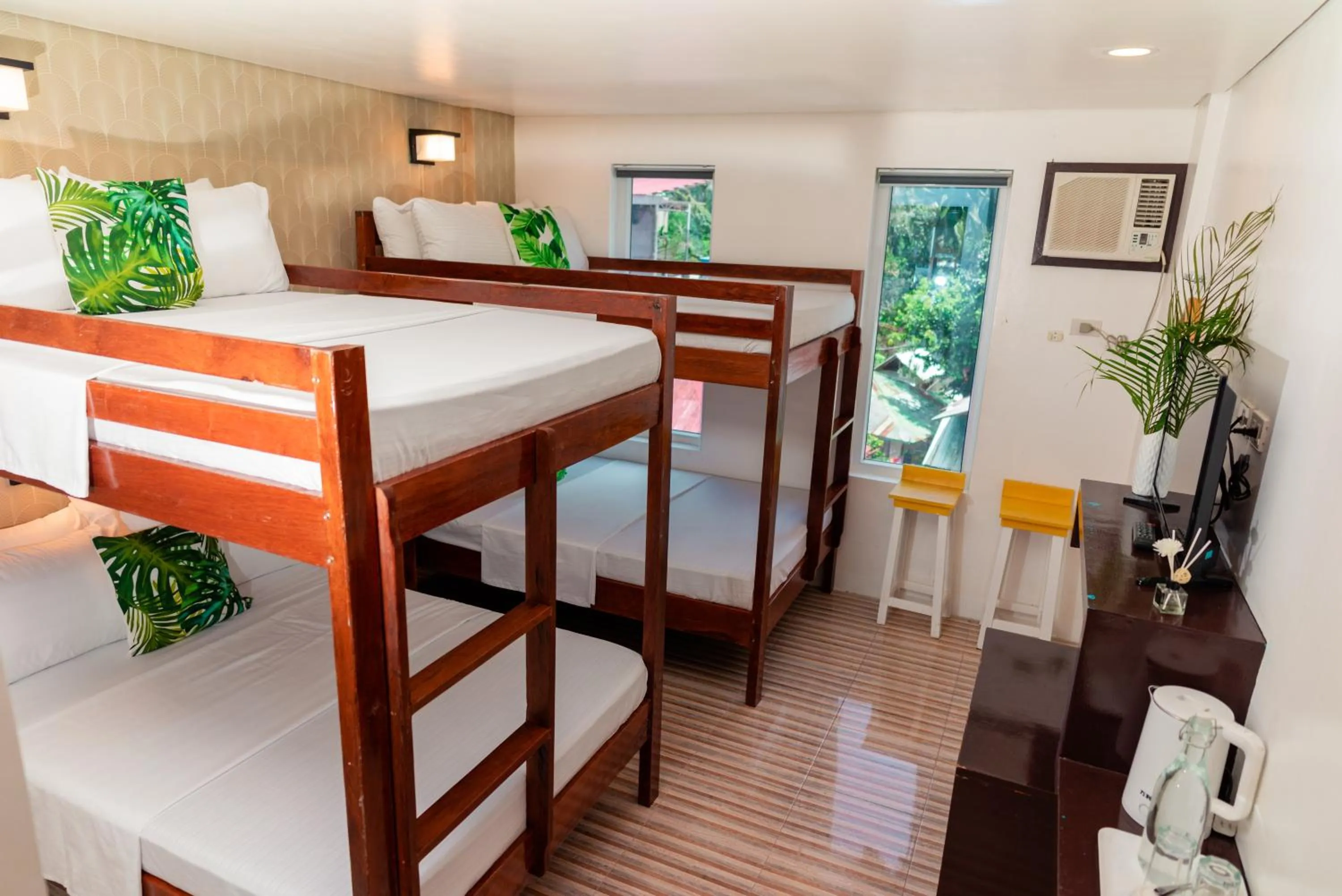 Bed in DENGI INN EL NIDO