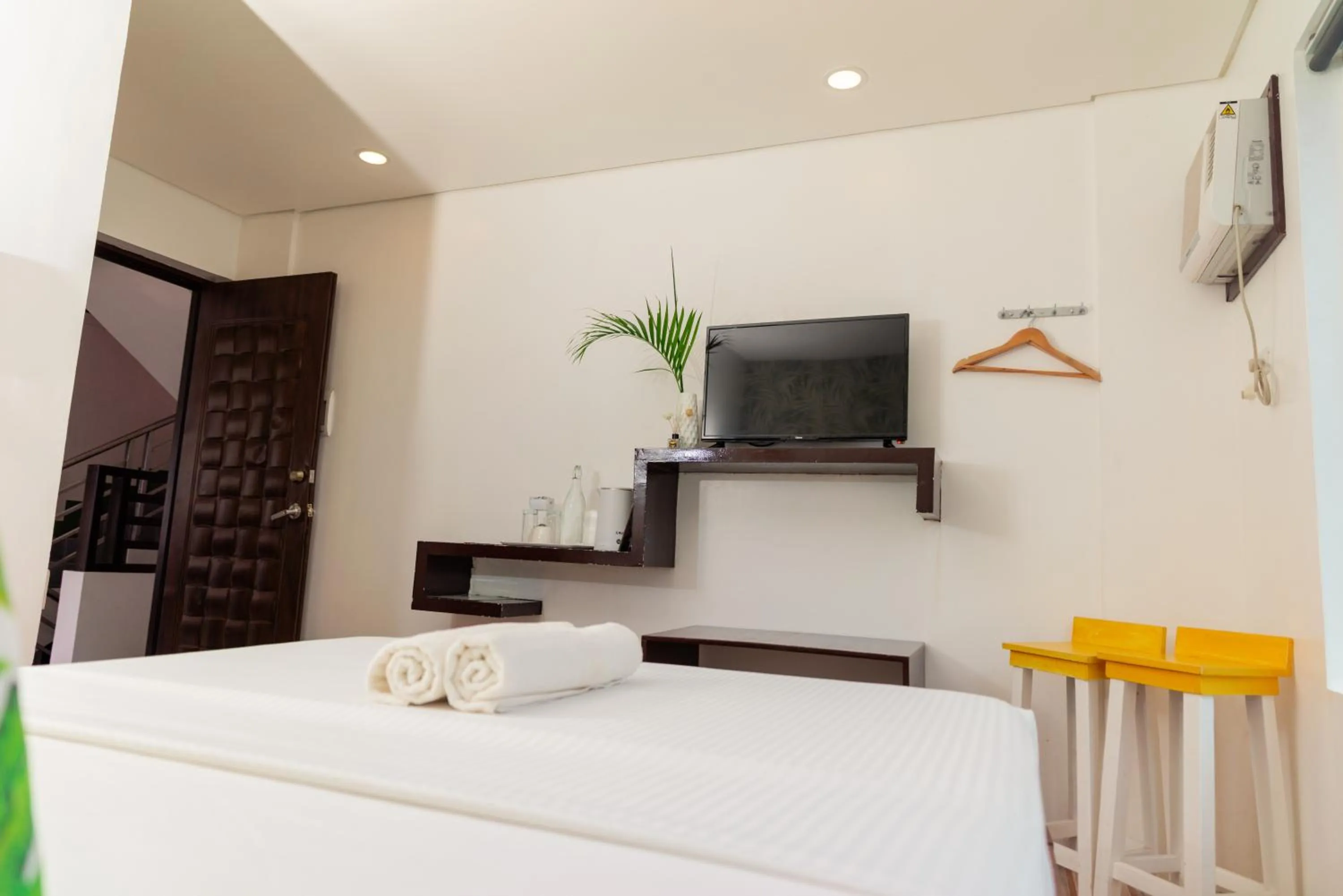 Bed in DENGI INN EL NIDO