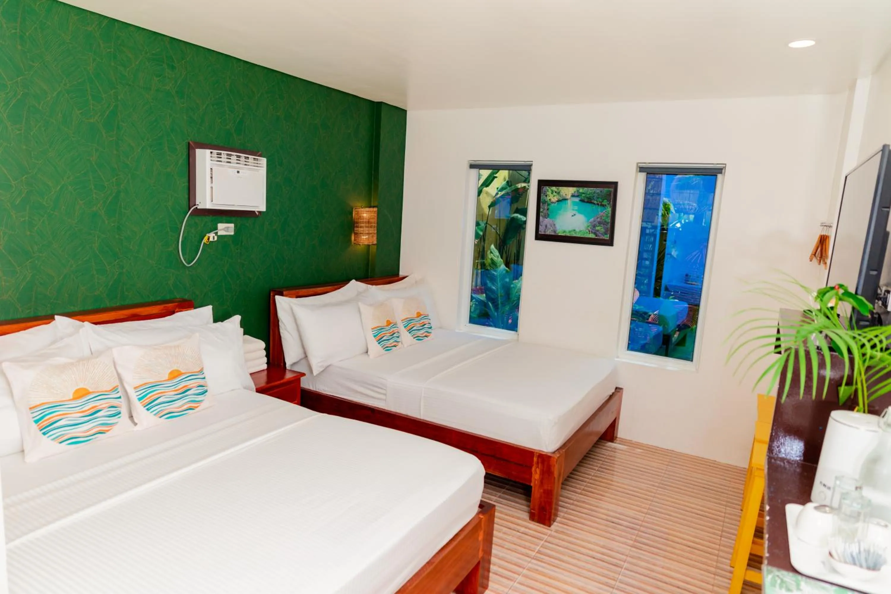 Bed in DENGI INN EL NIDO