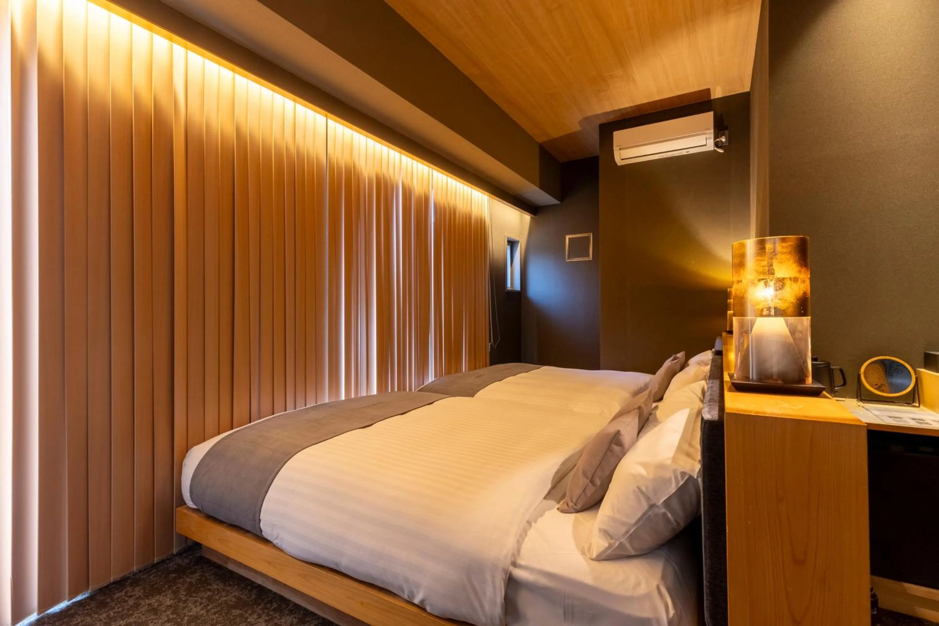 Bed in HOTEL TOMOS ASAKUSA