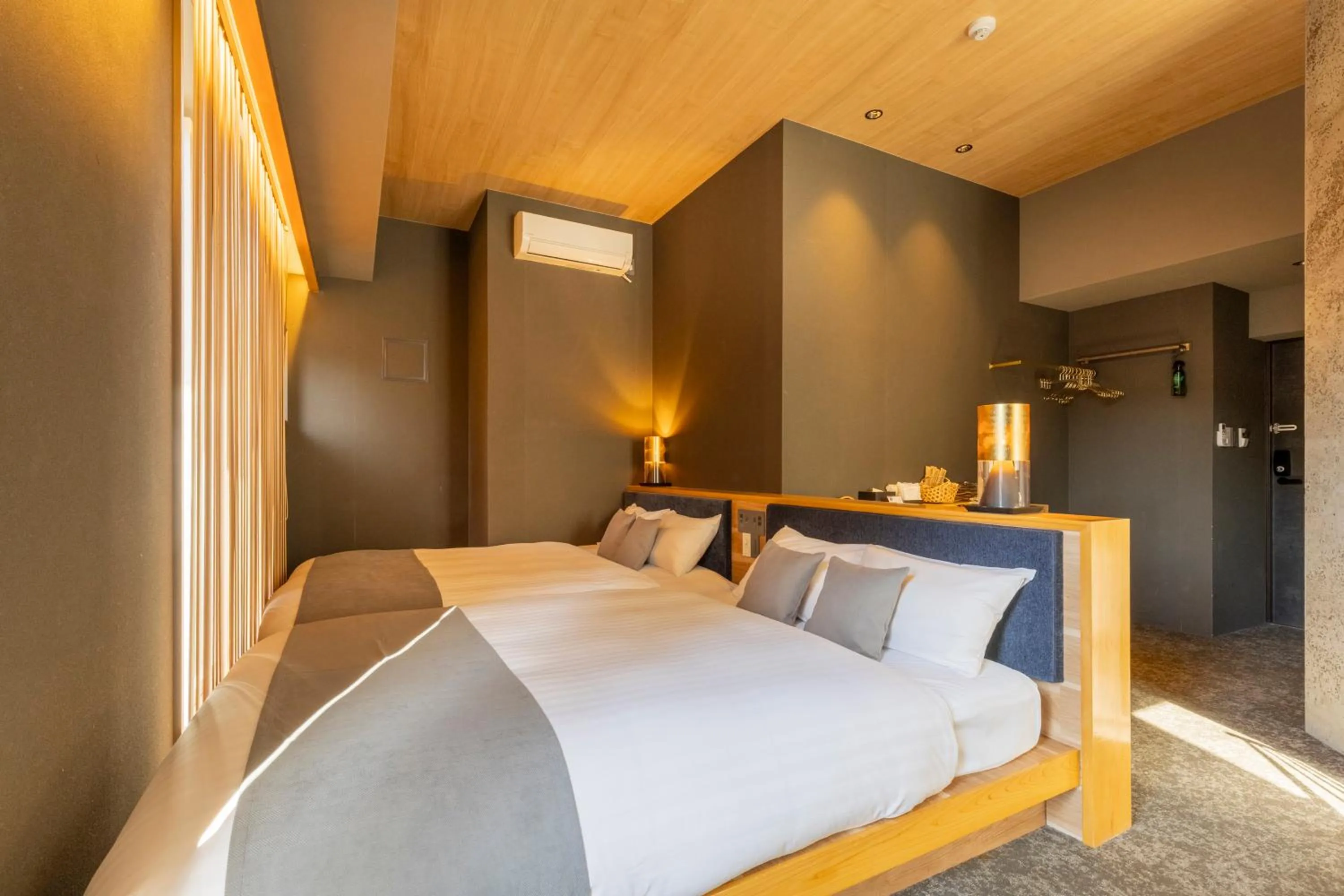 Bed in HOTEL TOMOS ASAKUSA